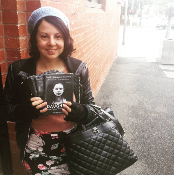Director Sarah Jayne (me) in St Kilda with 5 fresh copies to hand over to ATOM 