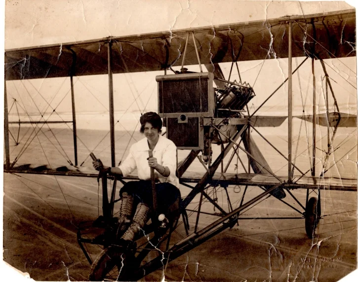 Ruth learned to fly on a Wright plane with lever controls, so she substituted them for the steering wheel on her Curtiss biplane