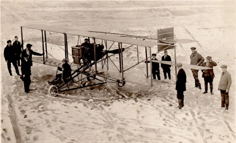 Ruth sits for the first time in her new Curtiss Model D biplane in Hammondsport, NY, 1915