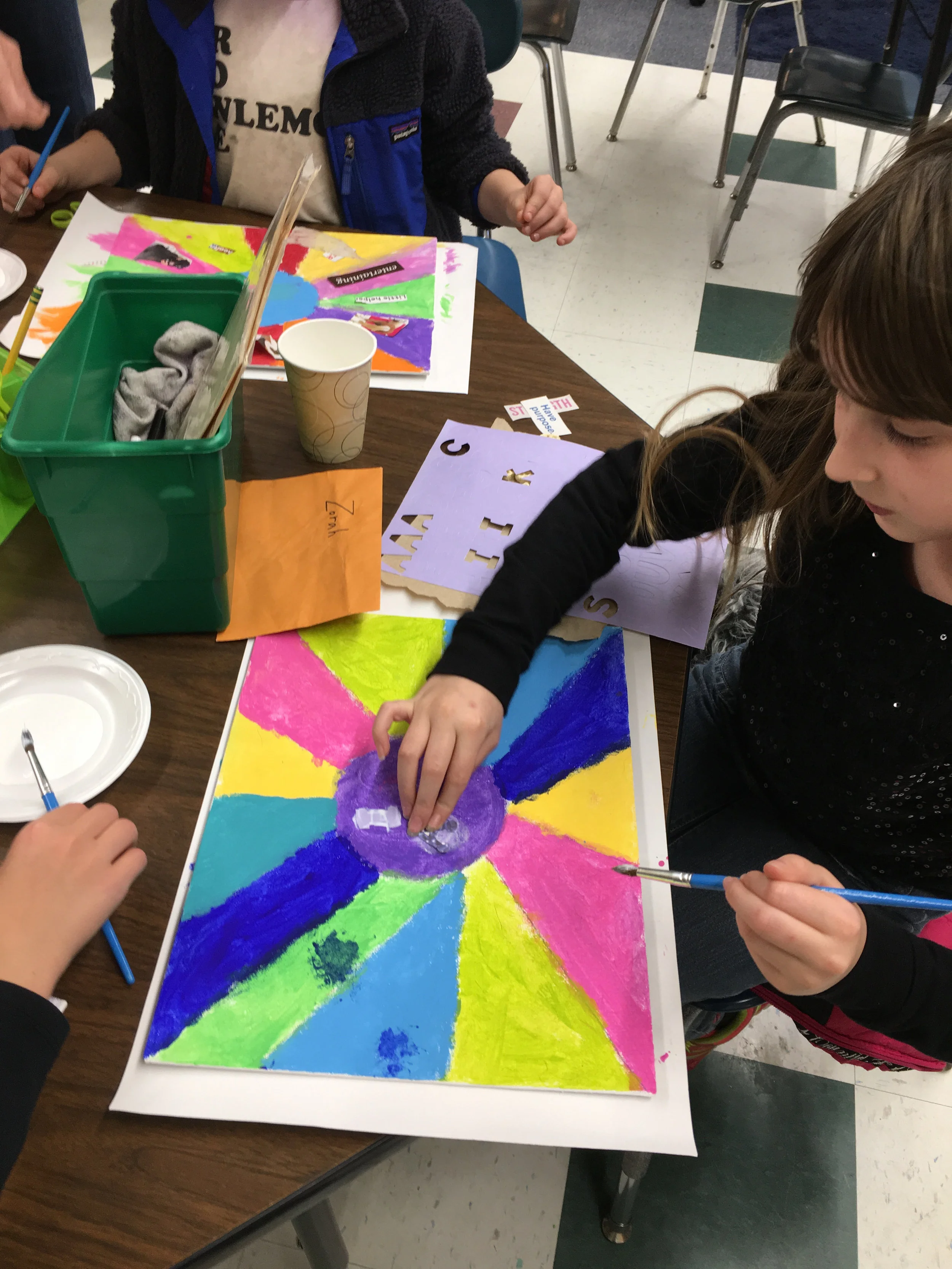 The girls begin work on their "I Am" vision boards
