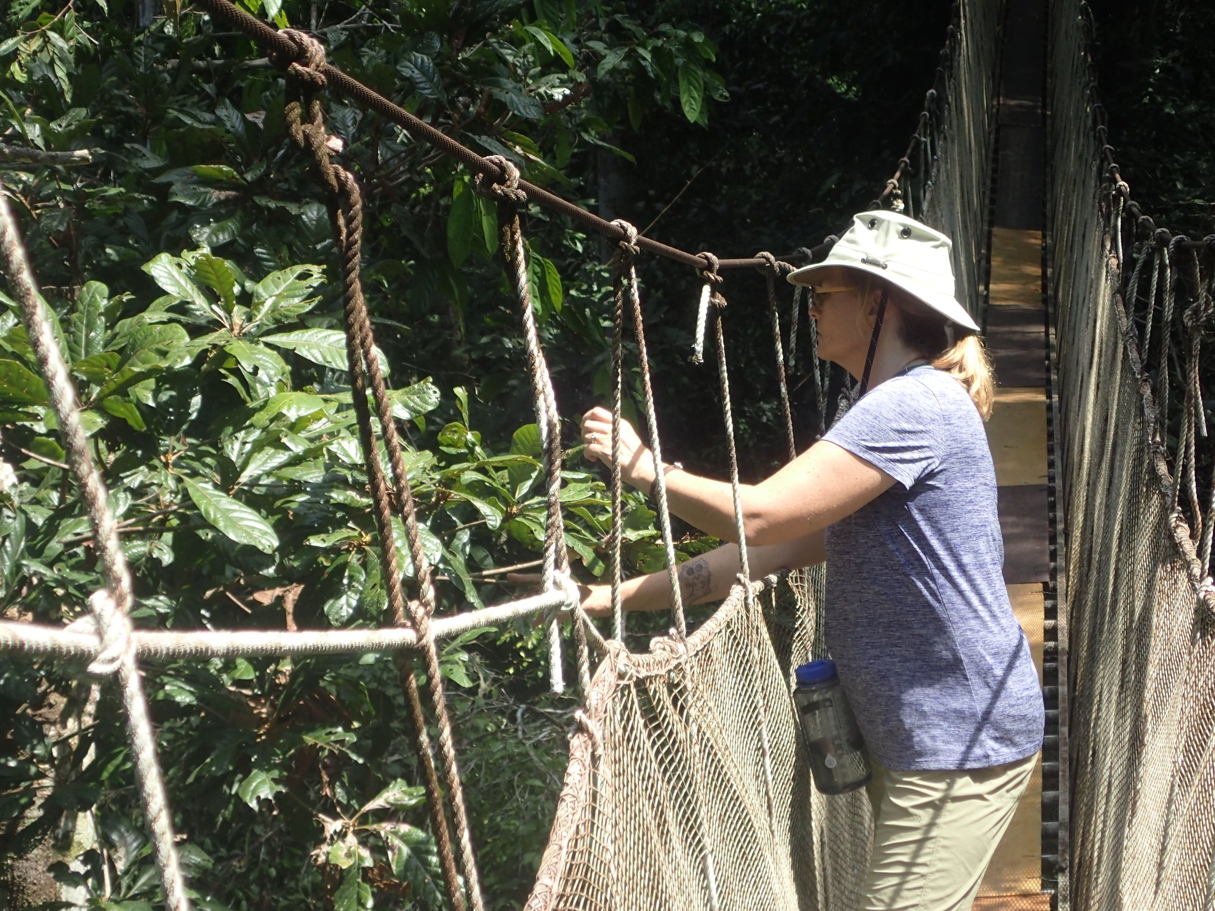 heather doing leaf detective work.jpg