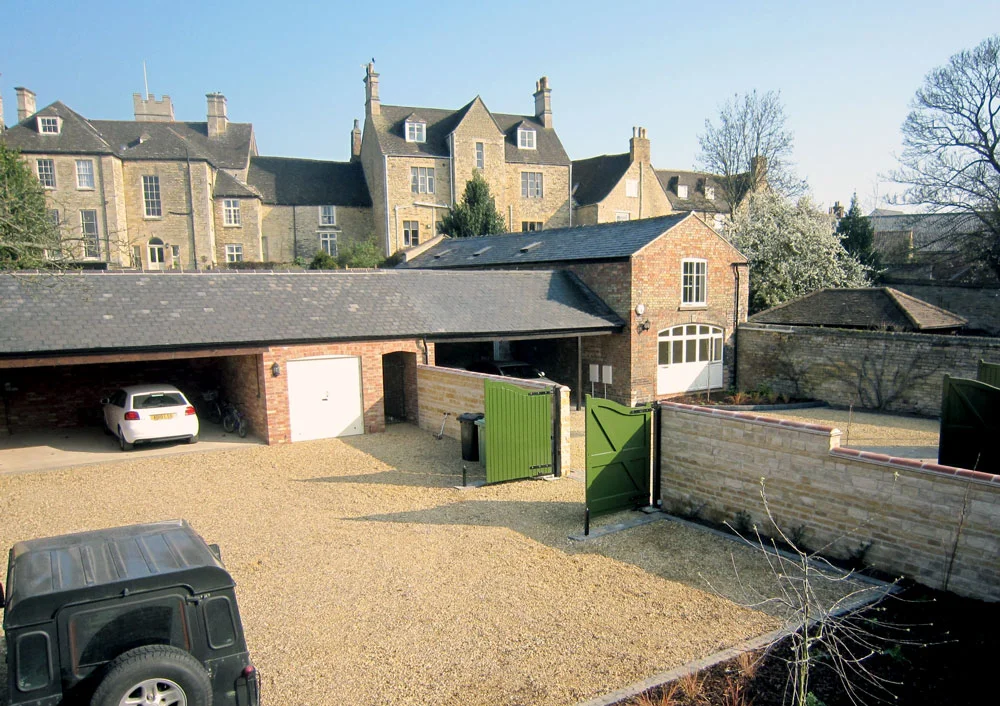 Conversion to three bed house with parking areas