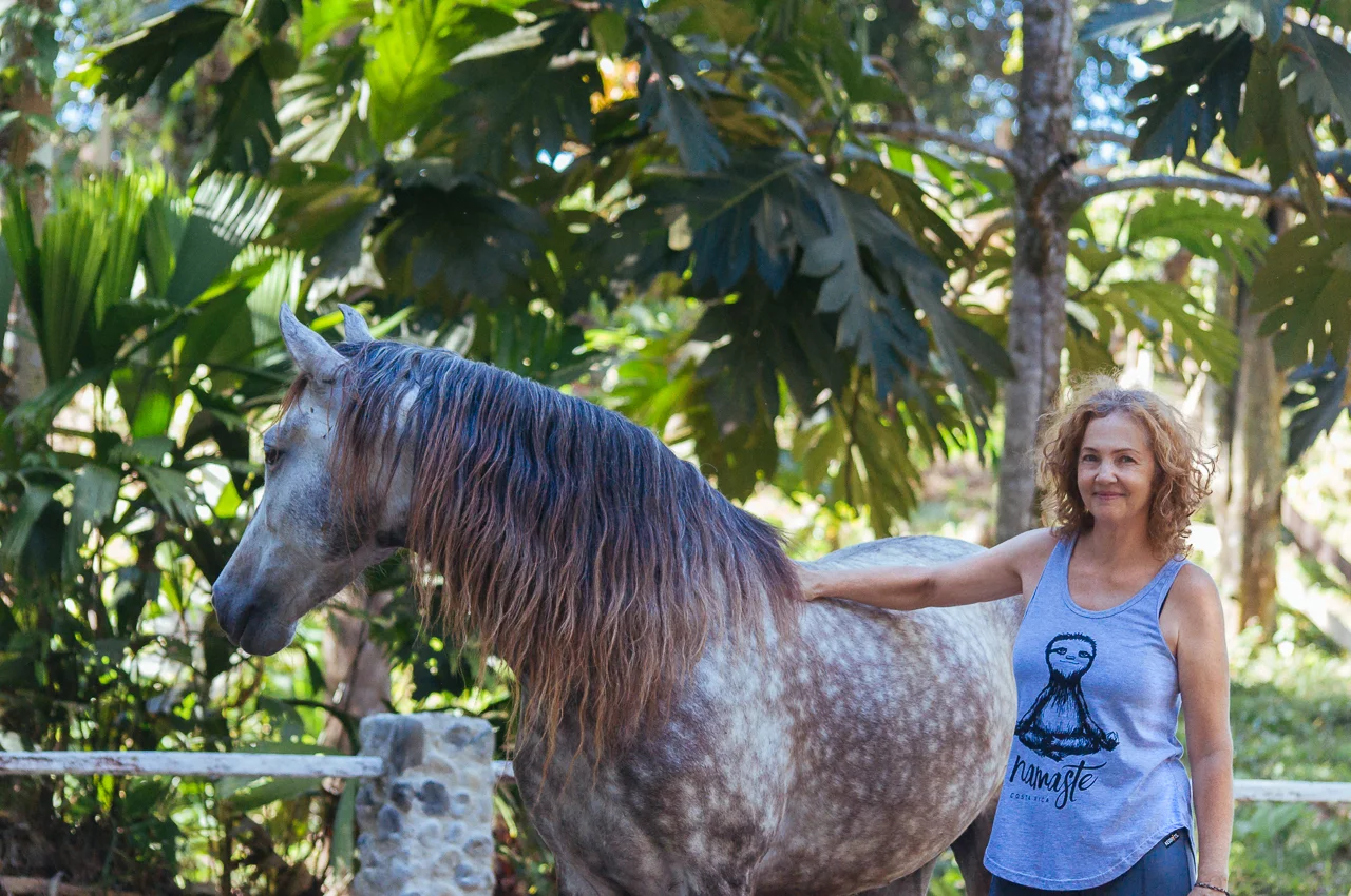Terry Newton, host and Yoga teacher, with Nahar, andalusian horse.