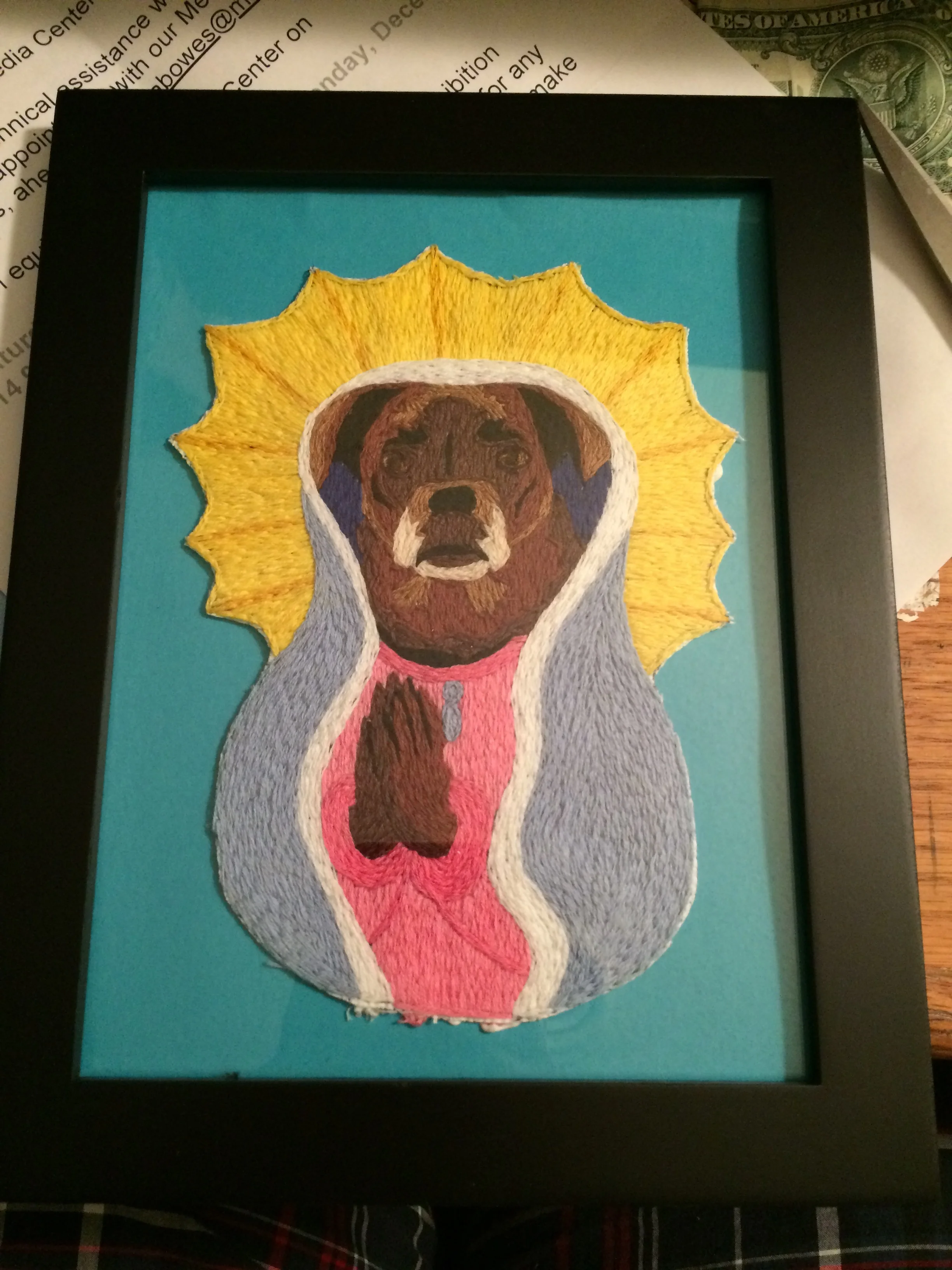 A commissioned portrait of someone's dog as Maria De Guadalupe. 