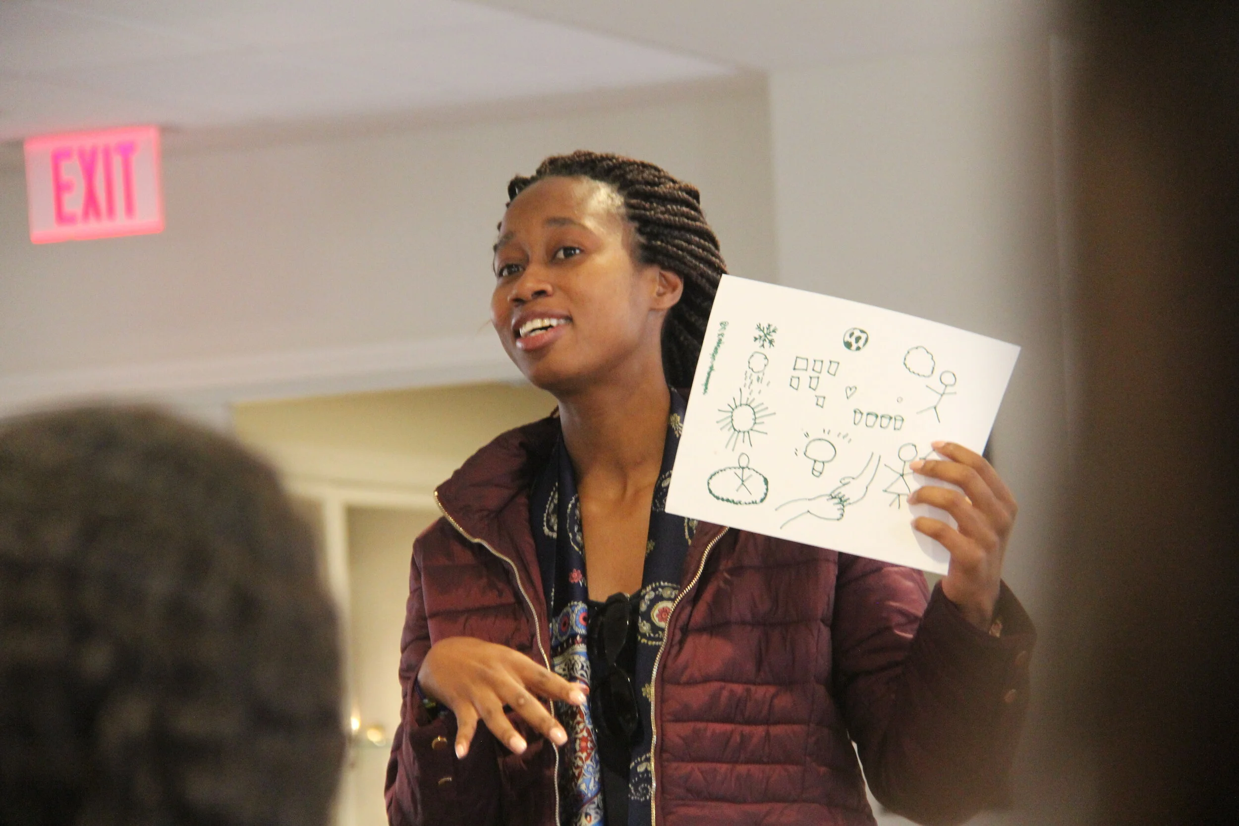 A delegate presenting during a quick brainstorming session at the summit.