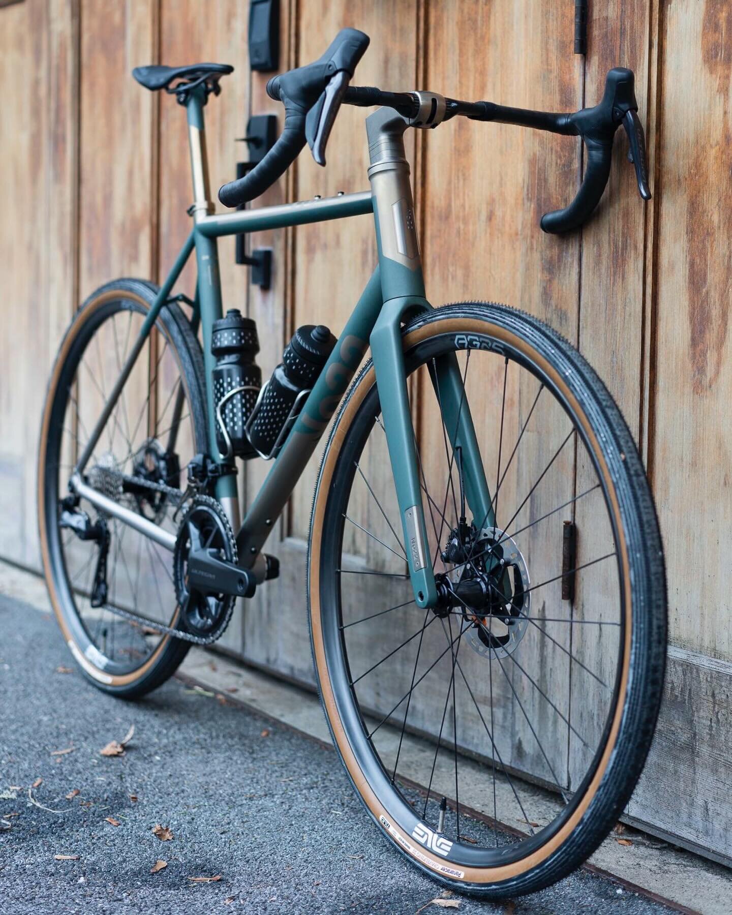 Meet our No. 22 Drifter &ndash; a bespoke gravel warrior in Charcoal Green Cerakote and Anodized Brass. Shimano Ultegra Di2 components, Enve AG25 wheels, and Panaracer tires &ndash; a ride that&rsquo;s as stylish as it is adventurous. Questions? Reac