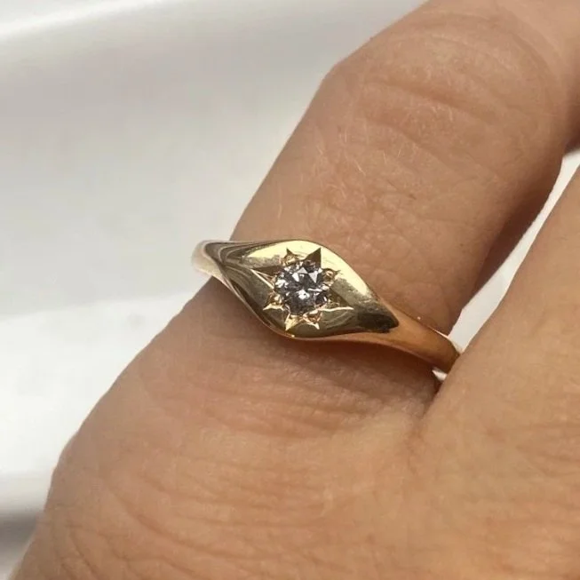 star set salt and pepper diamond signet ring 14k recycled yellow gold on pinkie kim drosdick toronto