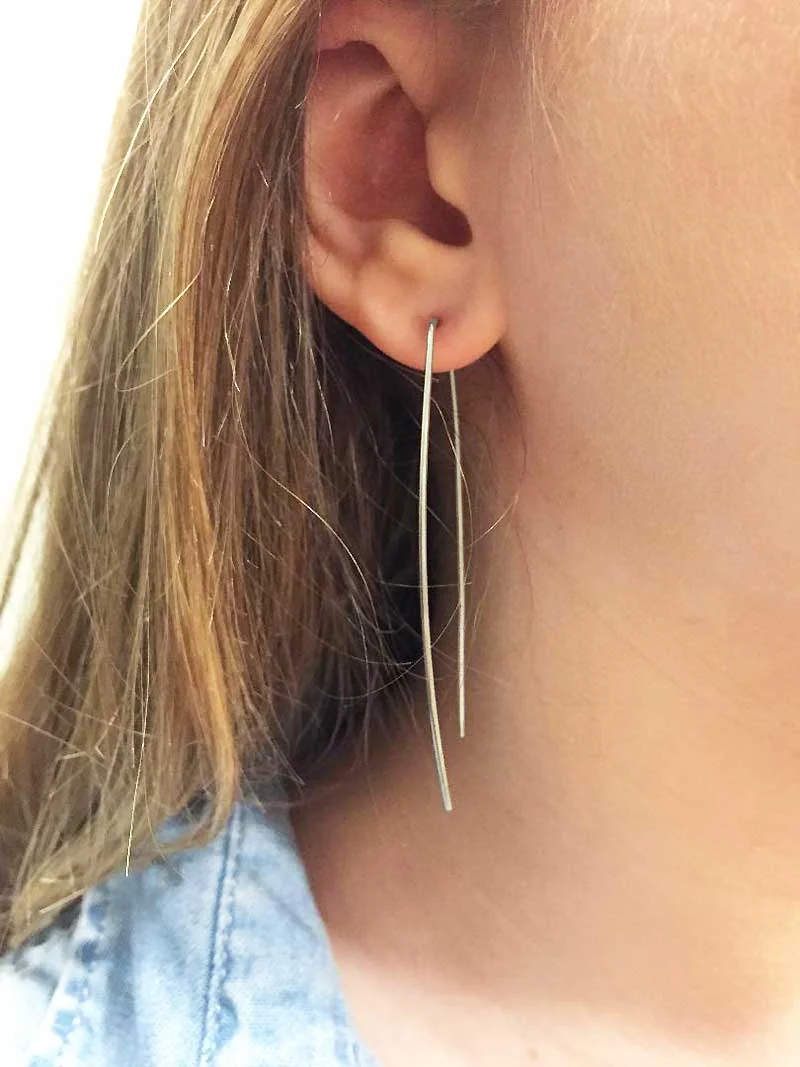 sterling silver stick earrings on model handmade by Toronto jewellery designer Kim Drosdick