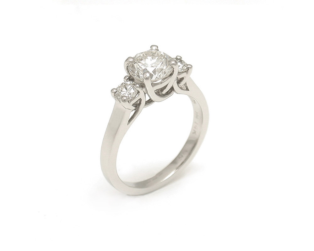 white-gold-handmade-trelis-style-three-stone-diamond-engagement-ring.jpg
