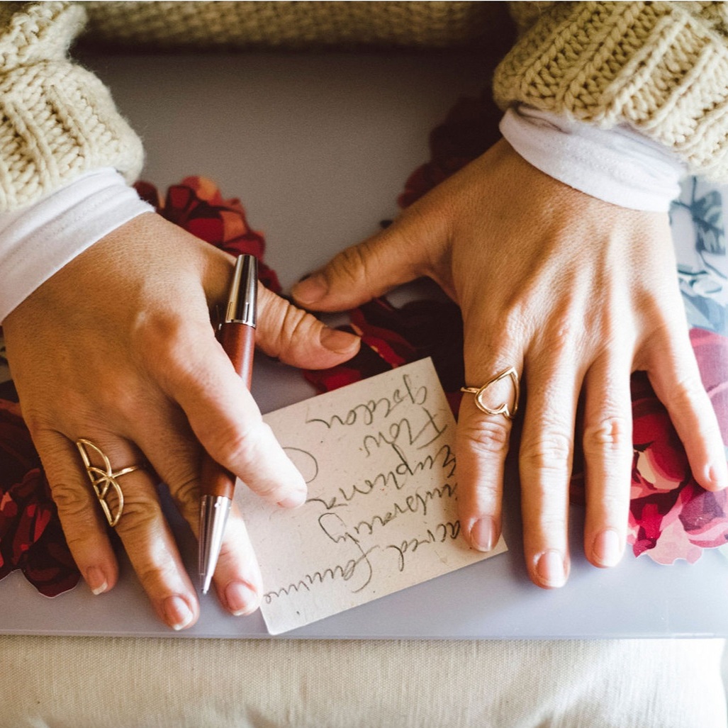 Danielle+writing+with+both+rings.jpg