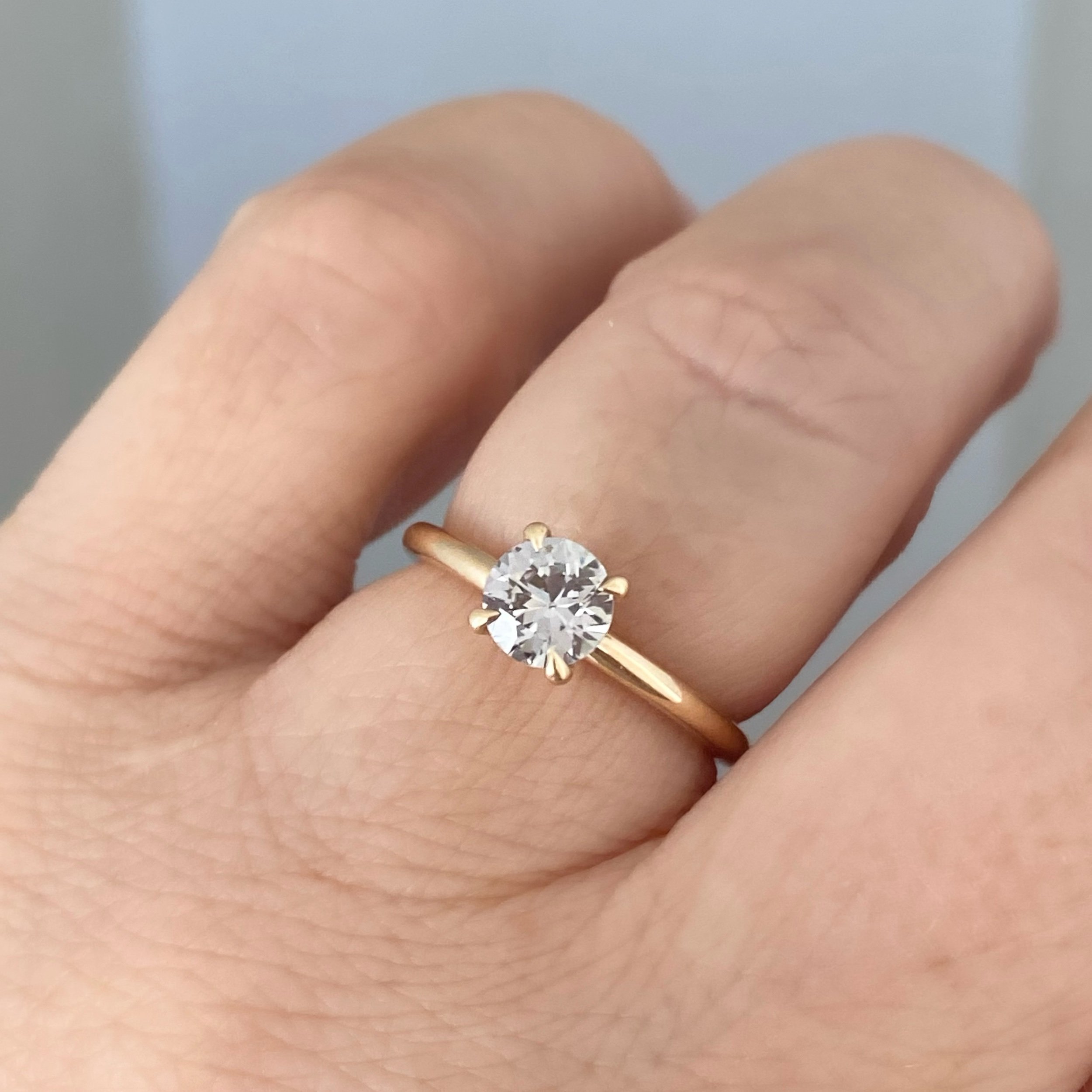 greige sapphire solitaire 14k yellow gold engagement ring toronto Kim Drosdick jewellery on hand
