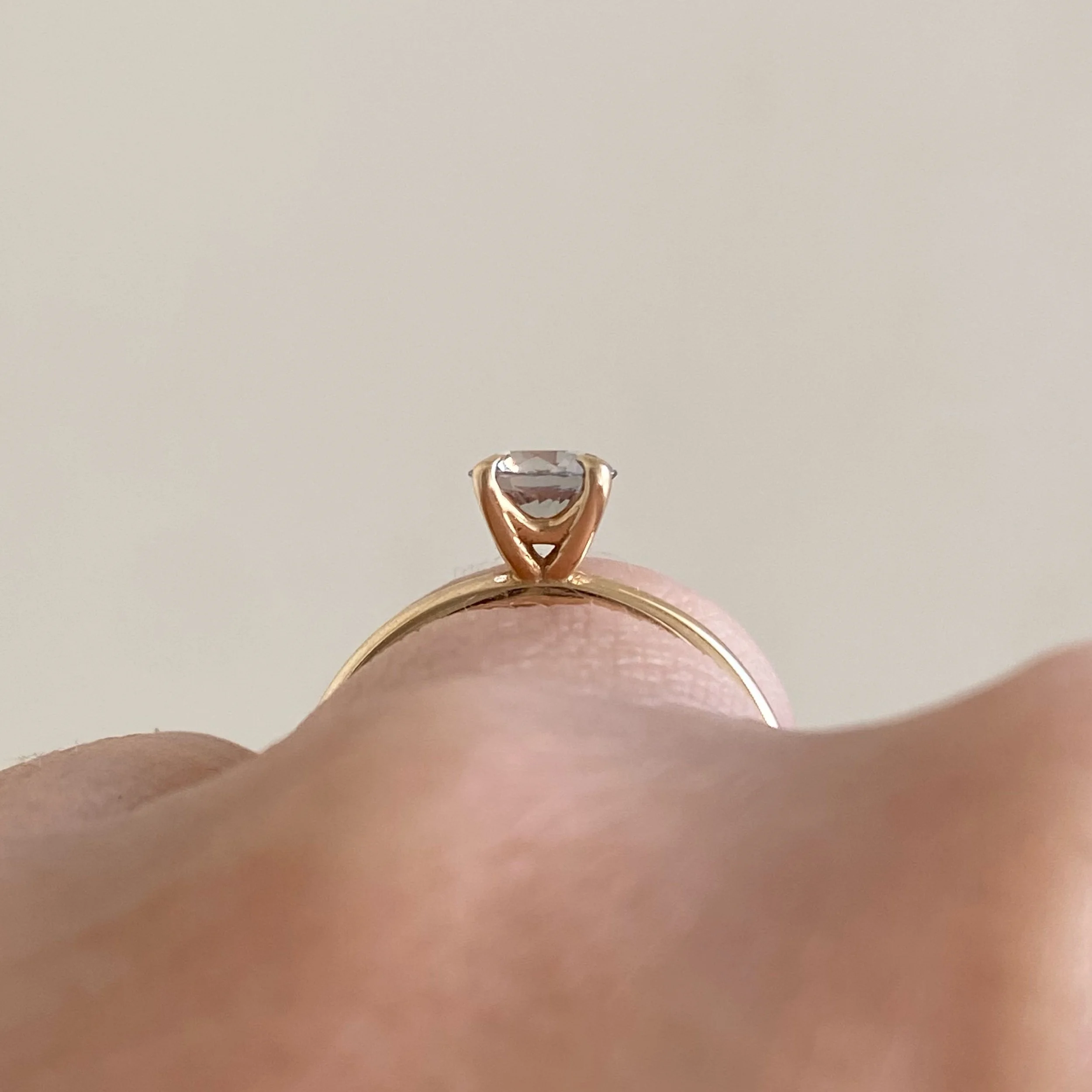 greige sapphire solitaire 14k yellow gold engagement ring toronto Kim Drosdick jewellery on hand