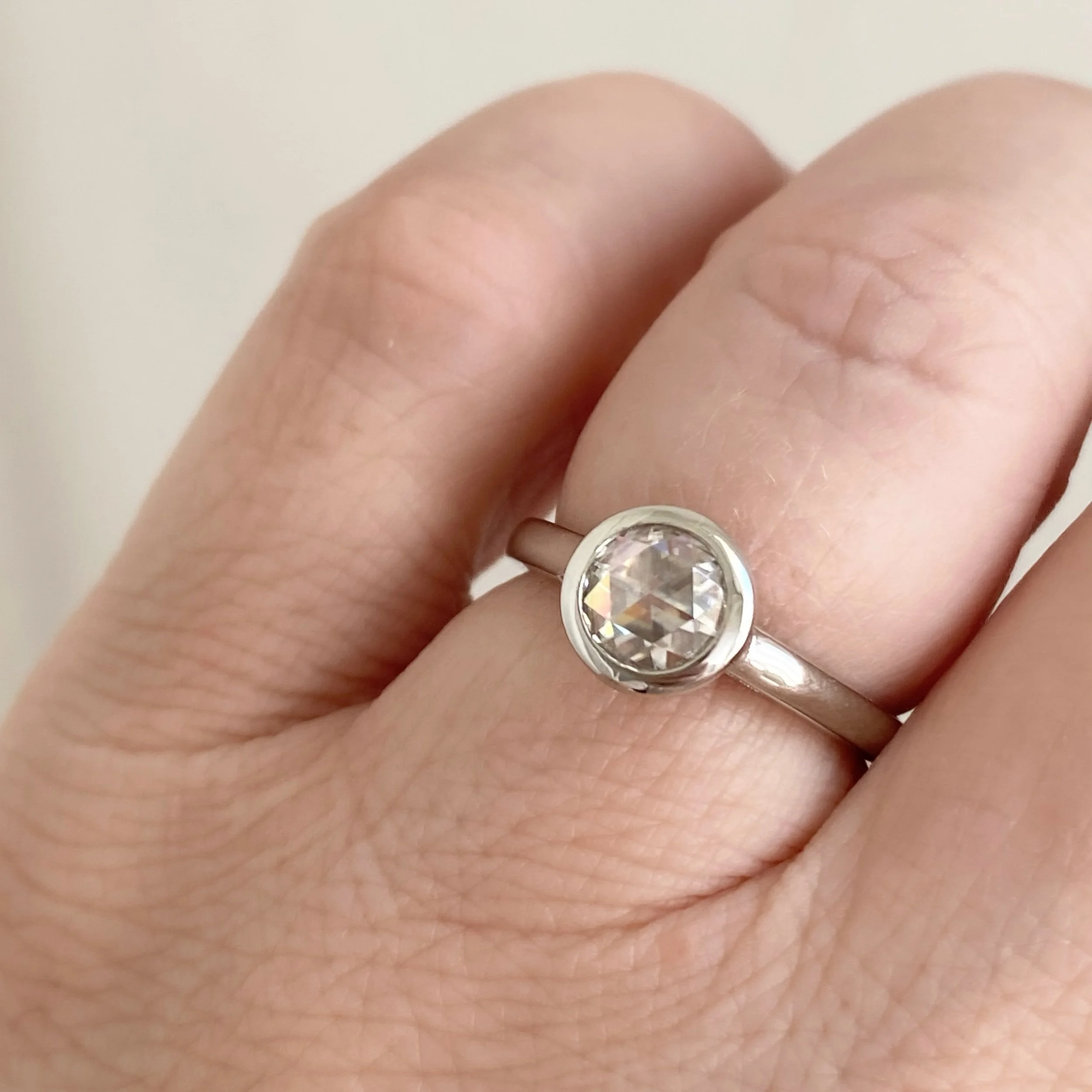 rose cut moissanite bezel set engagement ring solitaire Kim Drosdick Jewellery Toronto recycled gold on hand