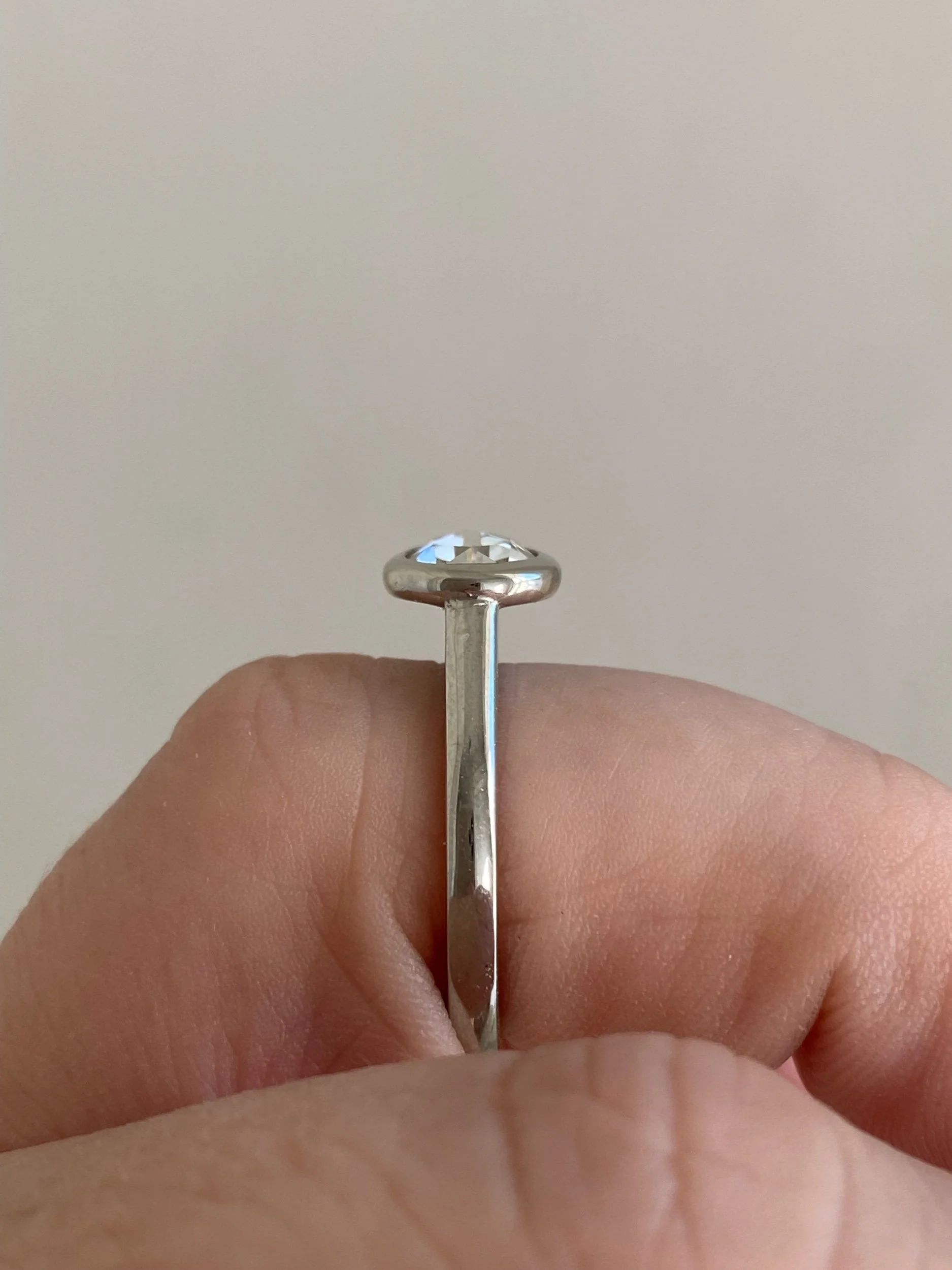 rose cut moissanite bezel set engagement ring solitaire Kim Drosdick Jewellery Toronto recycled gold on hand side view