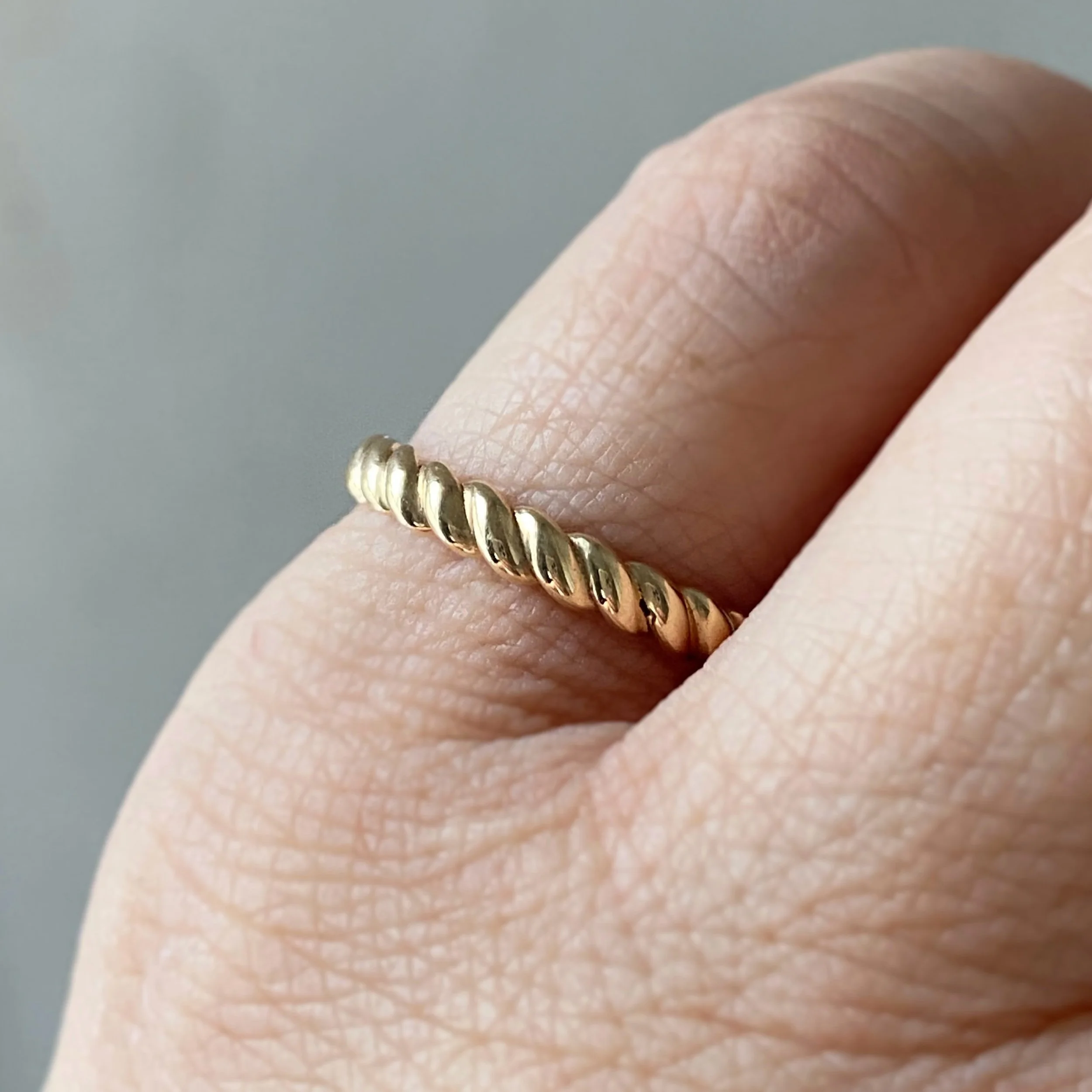 wide rope ring 14k recycled yellow gold stacking wedding ring on pinkie Kim Drosdick jewellery Toronto (Copy)