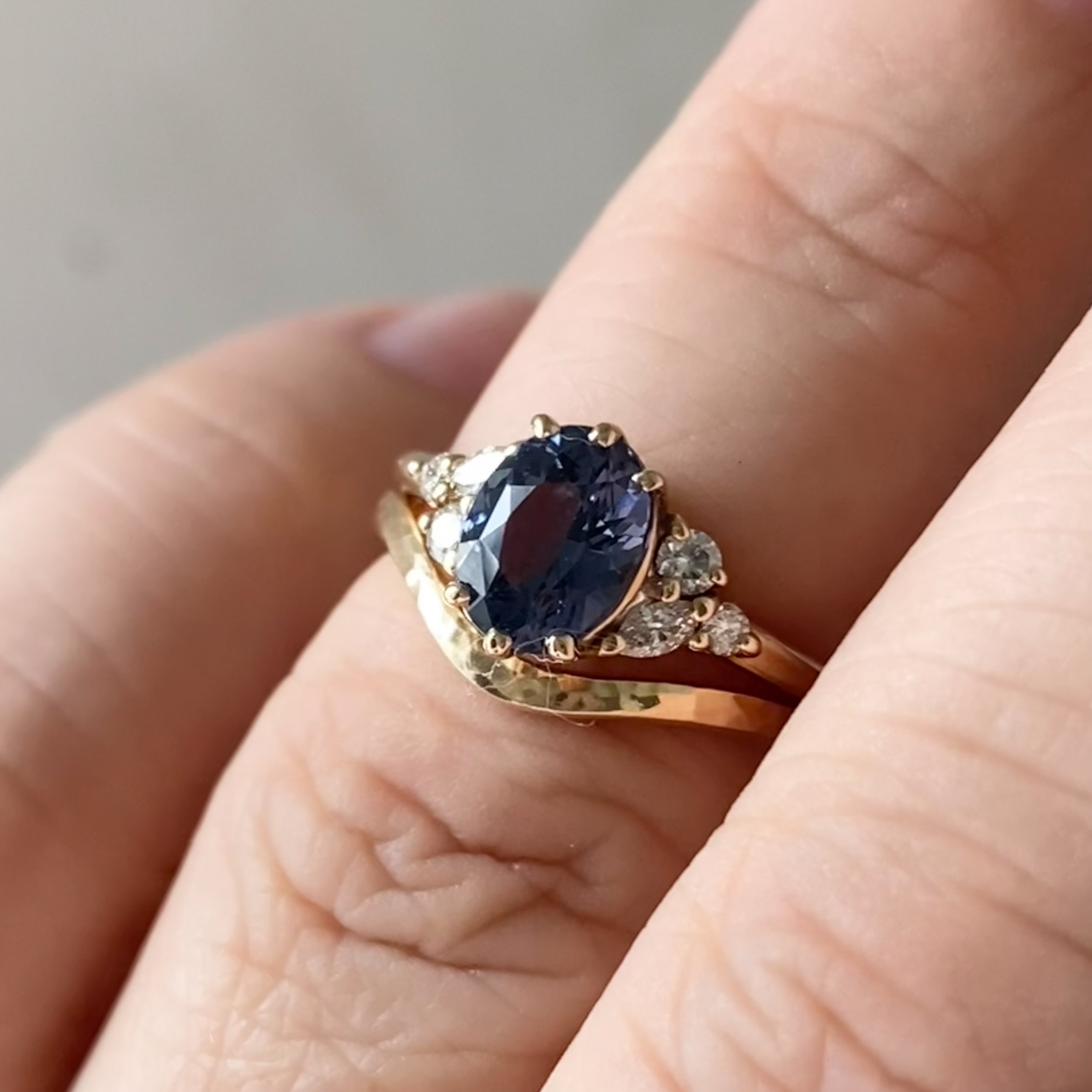 narrow hammered recycled 14k yellow gold contour wedding ring stacking band polished on hand with purple spinel and diamond clusters engagement ring boho organic vintage kim drosdick toronto