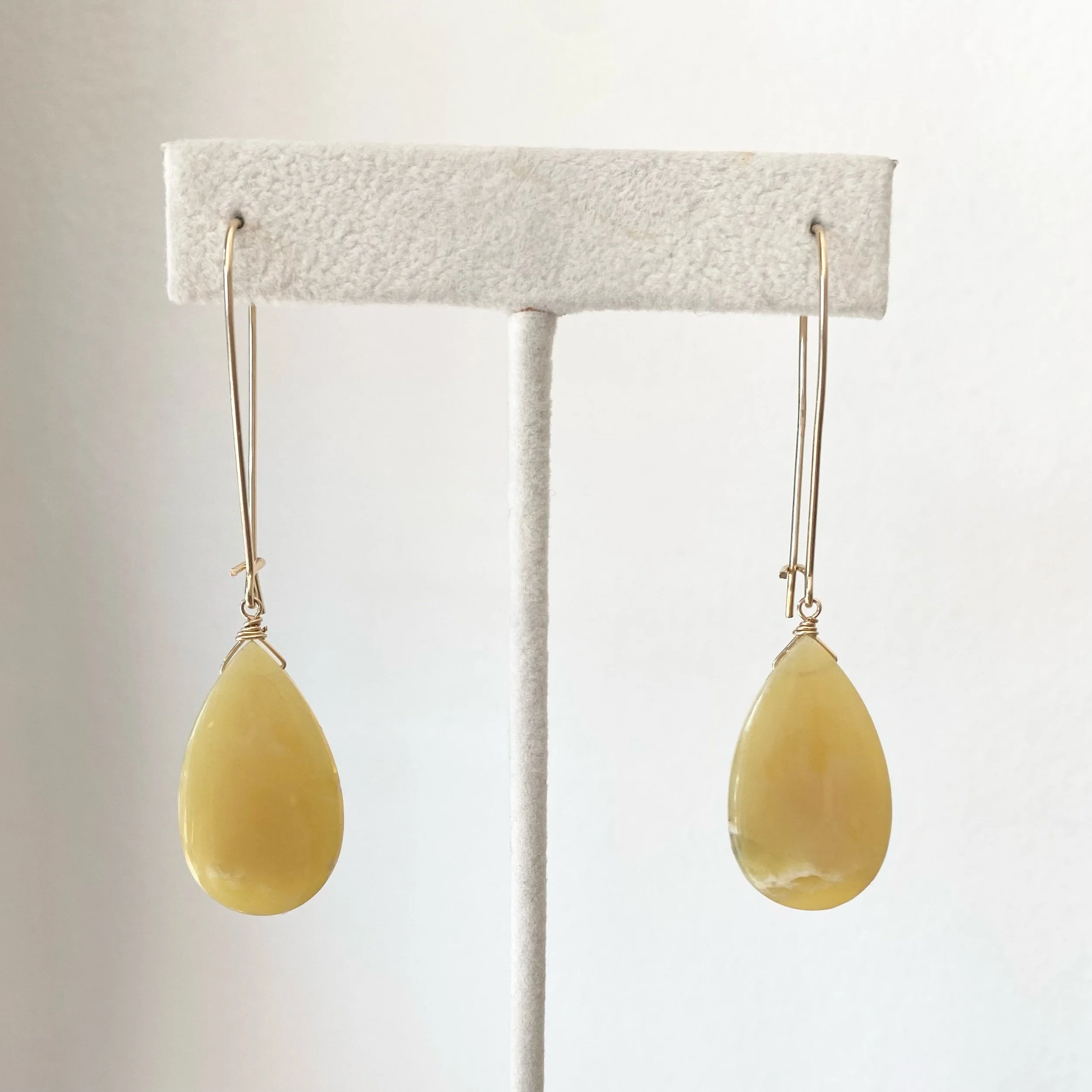 yellow opal gold filled wire wrapped dangly earrings on stand Kim Drosdick Toronto