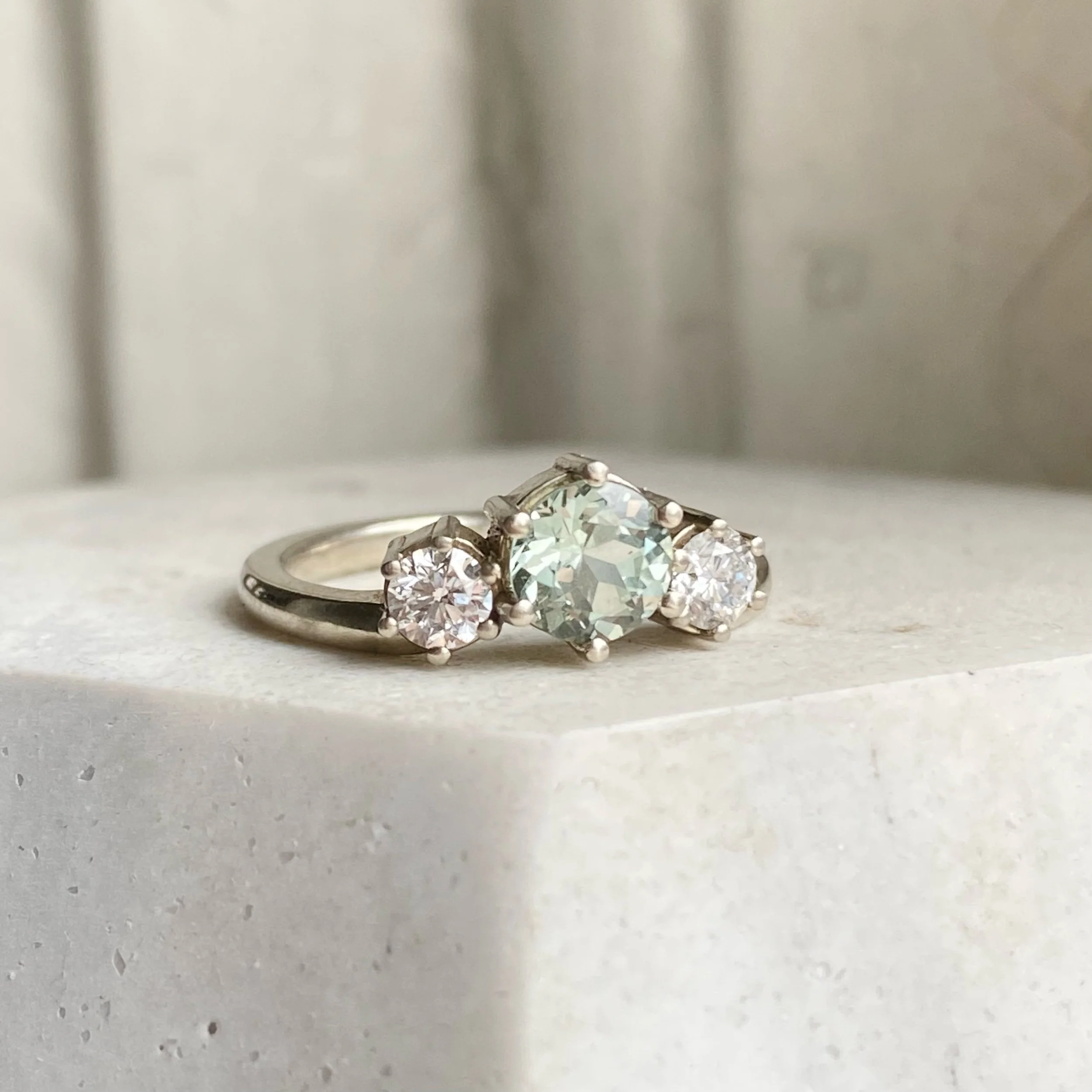bette davis ring minty green lab grown sapphire with side ab diamonds flush edge engagement ring 14k recycled white gold alt view on dish Kim Drosdick custom Jewellery