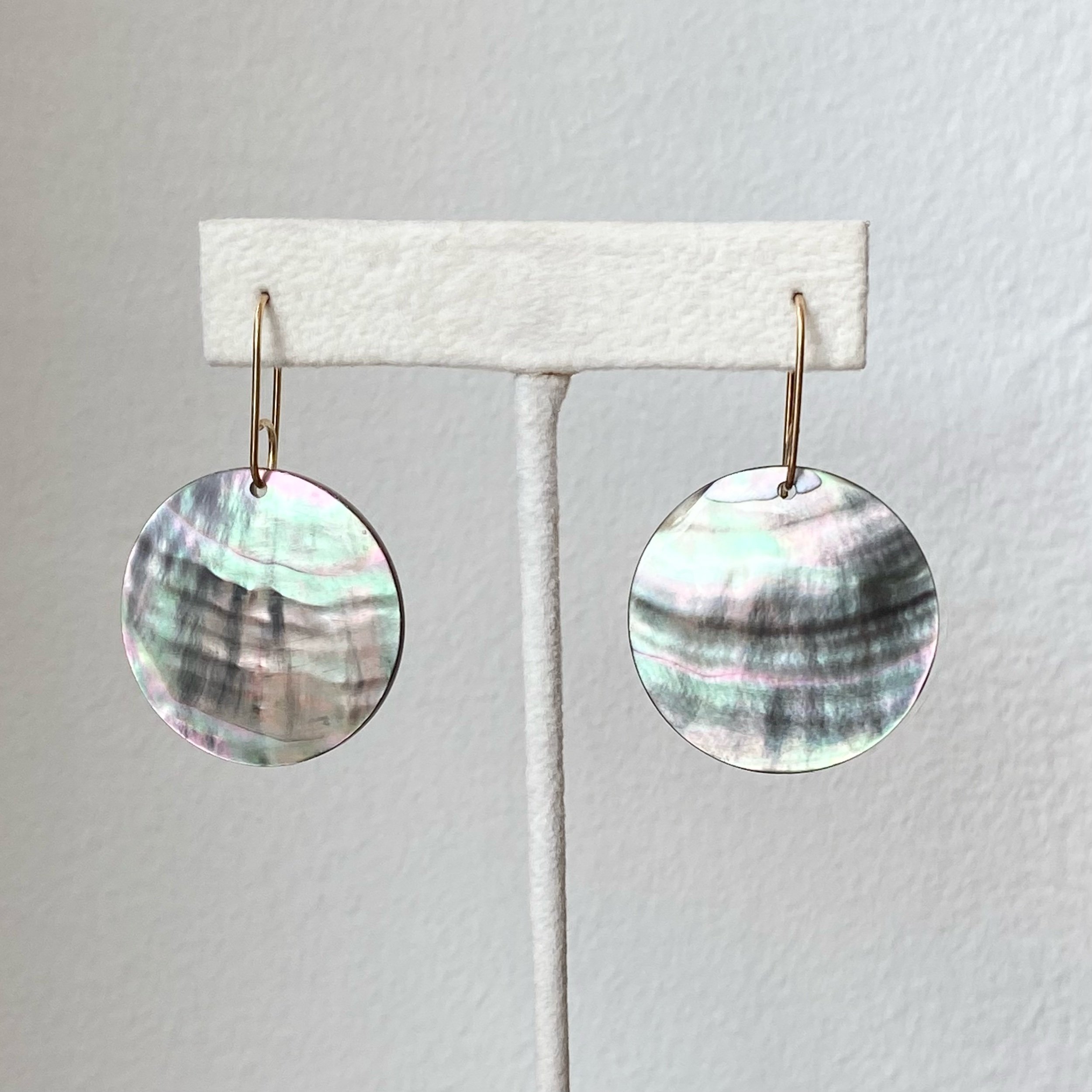 black mother of pearl earrings on earring stand Kim Drosdick Jewellery Toronto
