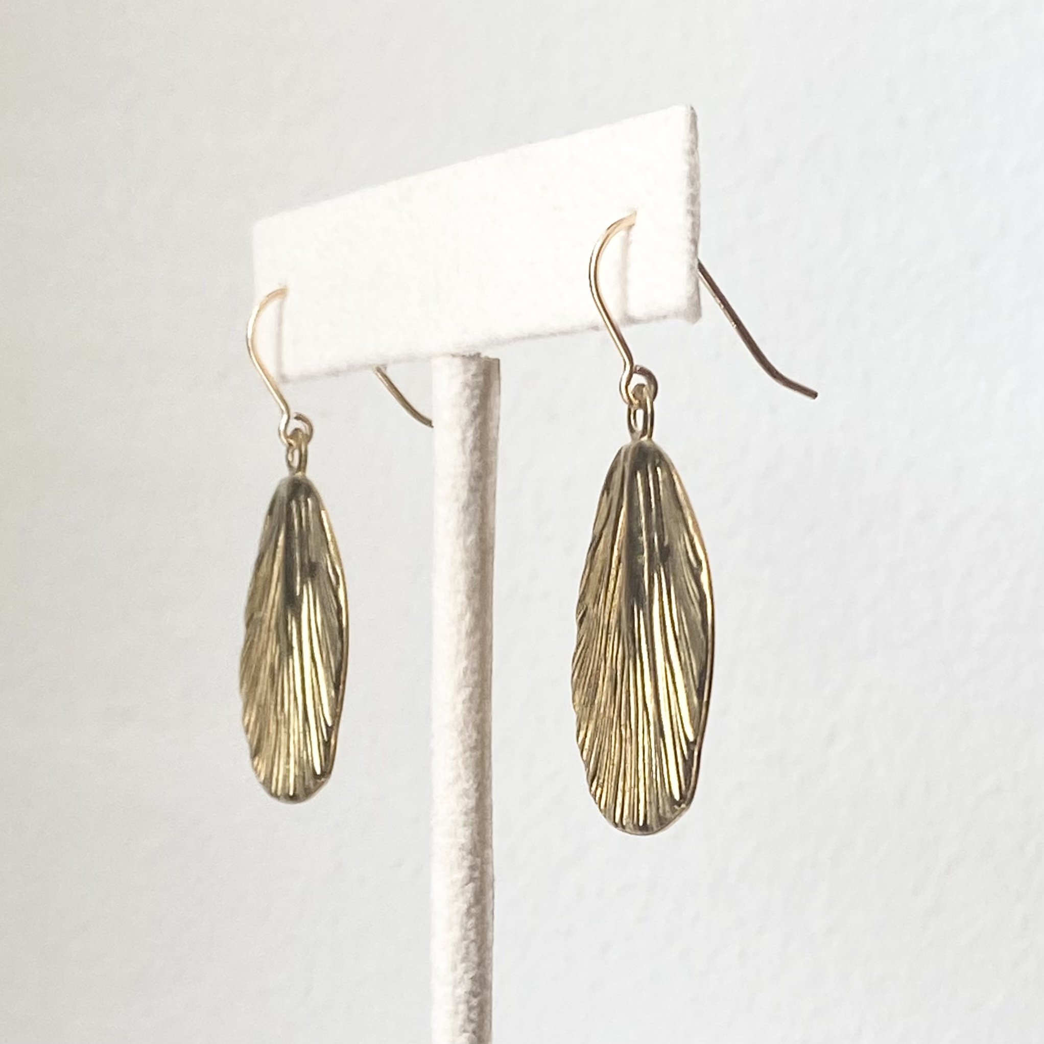 gold coated brass leaf earrings on stand gold filled findings Kim Drosdick Toronto