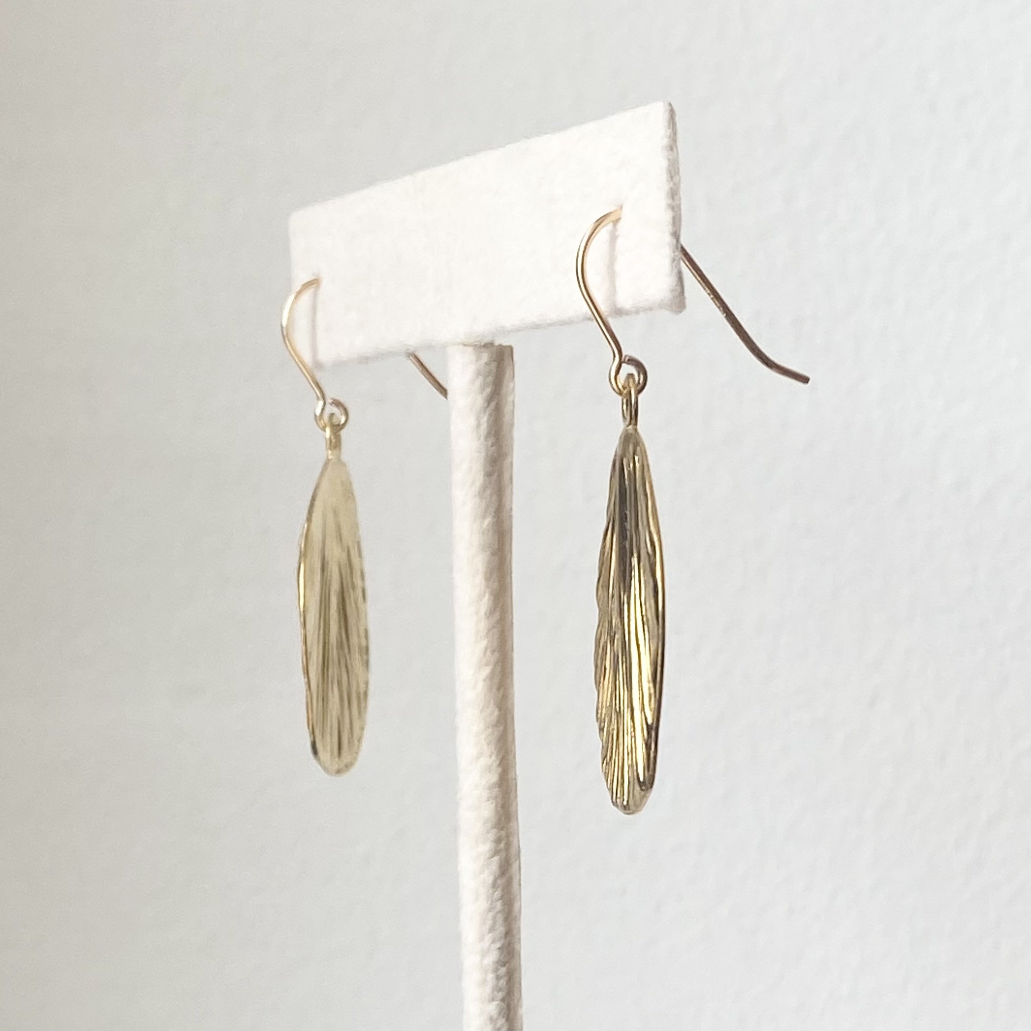gold coated brass leaf earrings on stand gold filled findings Kim Drosdick Toronto
