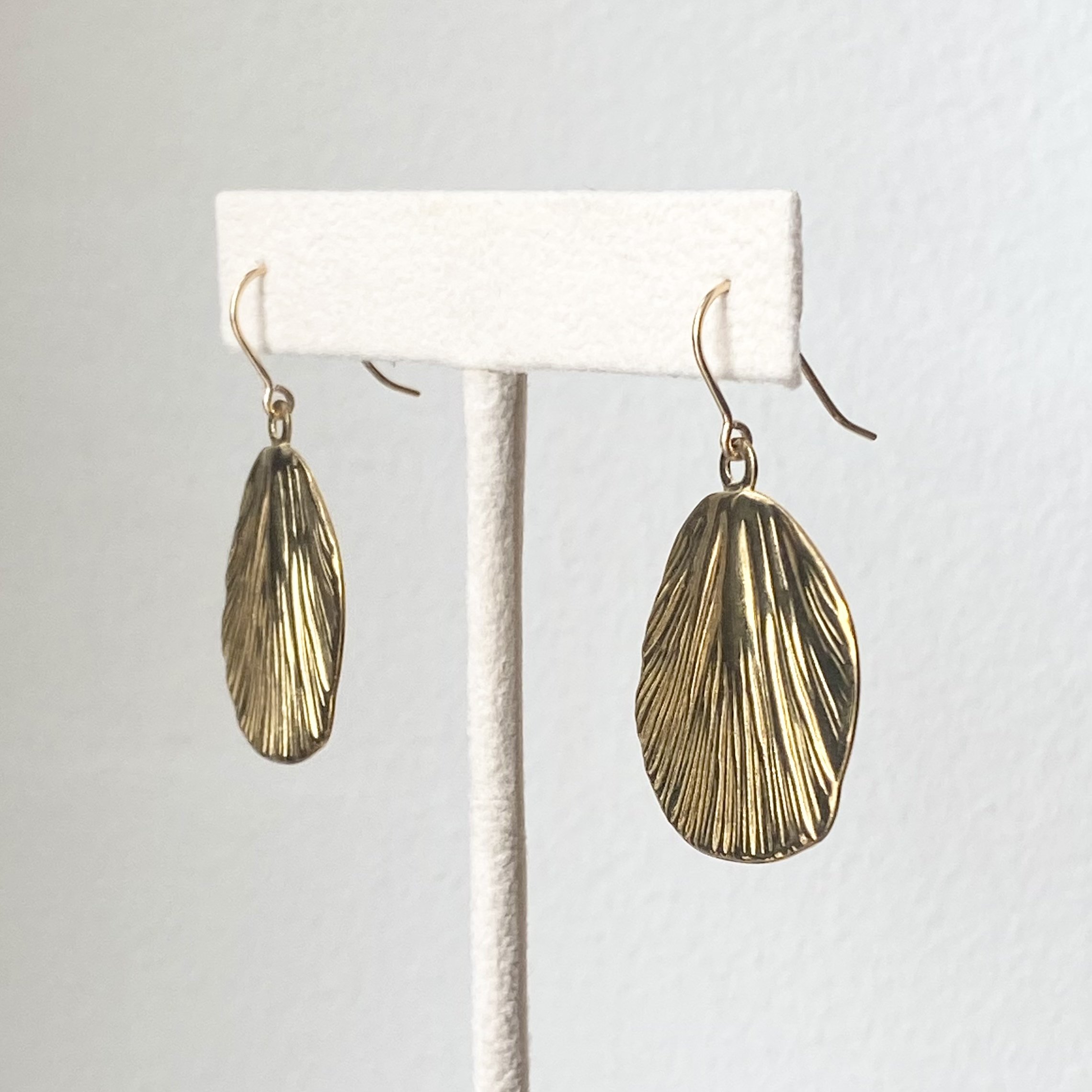 gold coated brass leaf earrings on stand gold filled findings Kim Drosdick Toronto