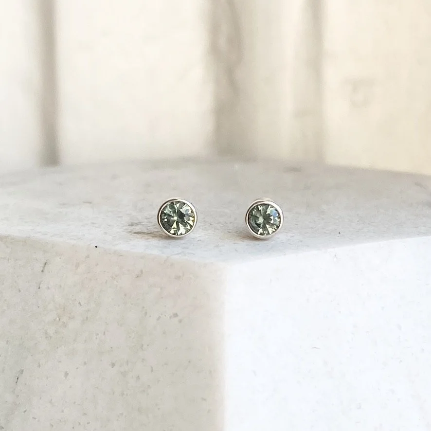 silver green bezel set sapphire studs Kim Drosdick on display Jewellery Toronto