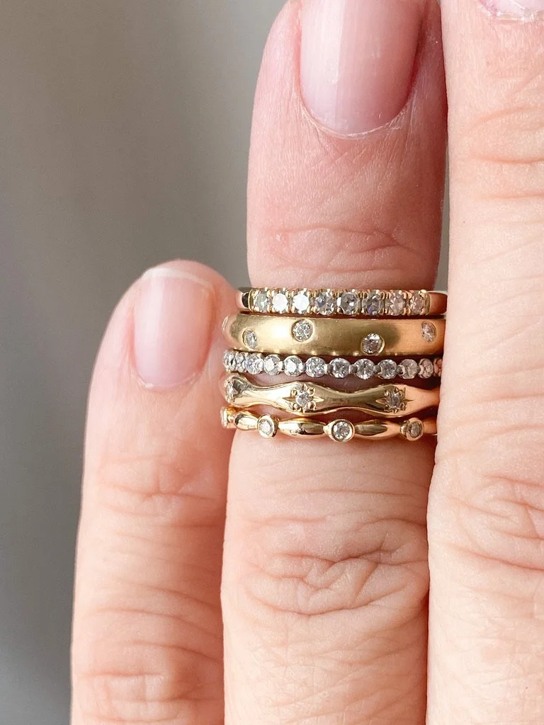 lab diamond platinum eternity wedding stacking ring shared single claw on hand in stack