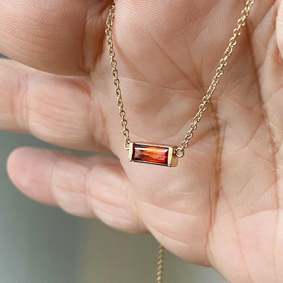 Madeira Citrine delicate east west yellow gold pendant on hand