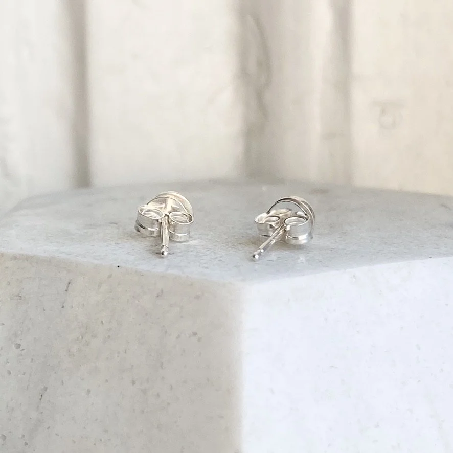silver stud muffin earrings cuttlefish casting size small on stand Kim Drosdick Jewellery Toronto