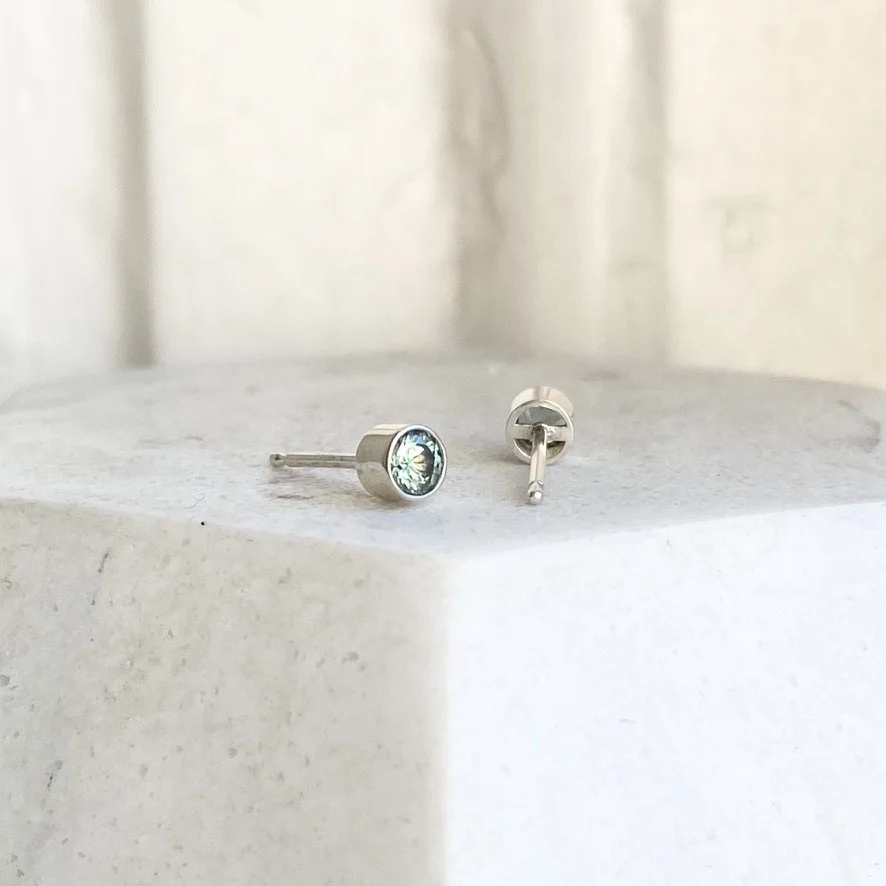 silver green bezel set sapphire studs Kim Drosdick on display