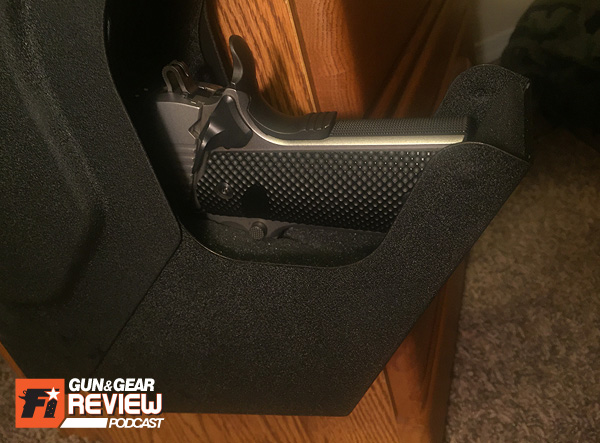 The SV-500 fits the entire full-size 1911 with no issue, and I can get my fingers around the frame to pull out.