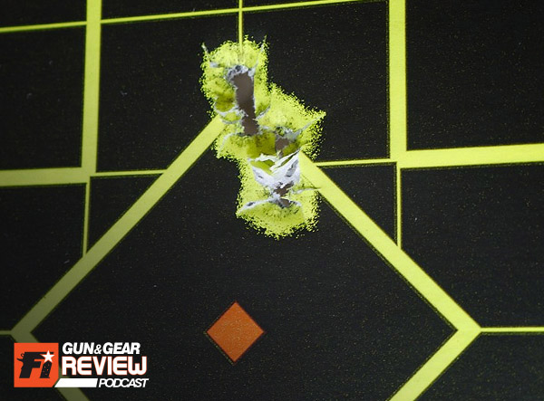 This group was shot aiming at the top of the diamond outline @ 15 yards using 115 grain FMJ ammo.