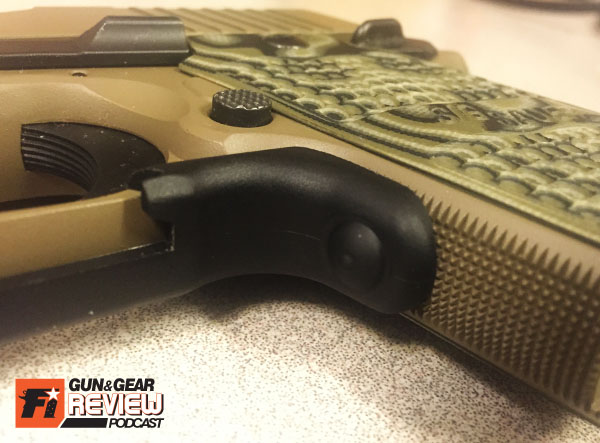 The button area is overmolded with rubber for comfort and wear resistance.