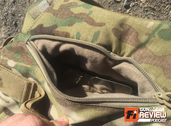 At the top there is a fleece lined pouch designated for sunglasses... I don't have Oakleys but it's a perfect spot for my reading glasses.