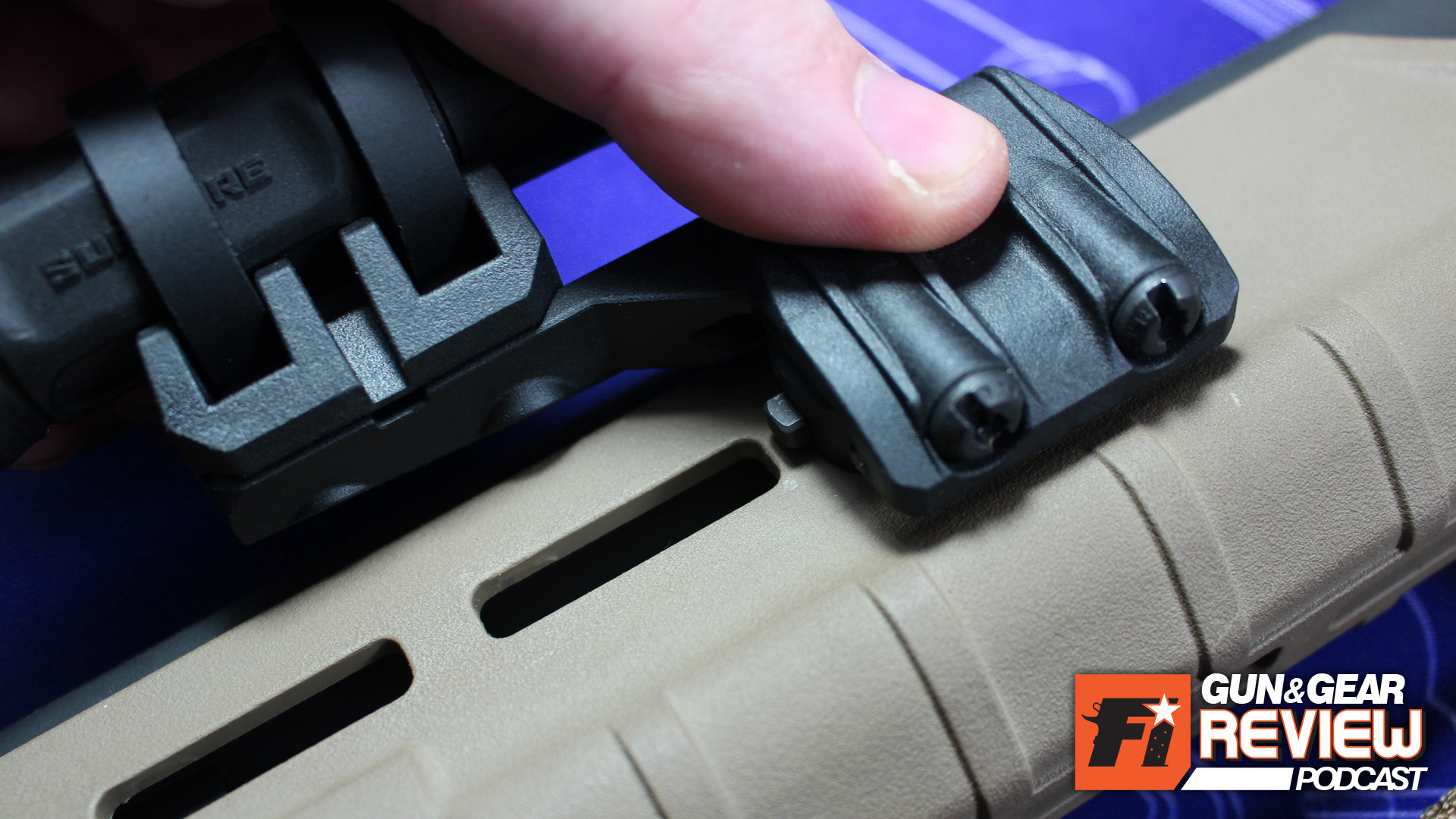 Step Two: Push firmly down in the center of the rail, to be sure even pressure is applied on both sides. You'll know the Kinect is locked in place properly if both tabs fully deploy outward.