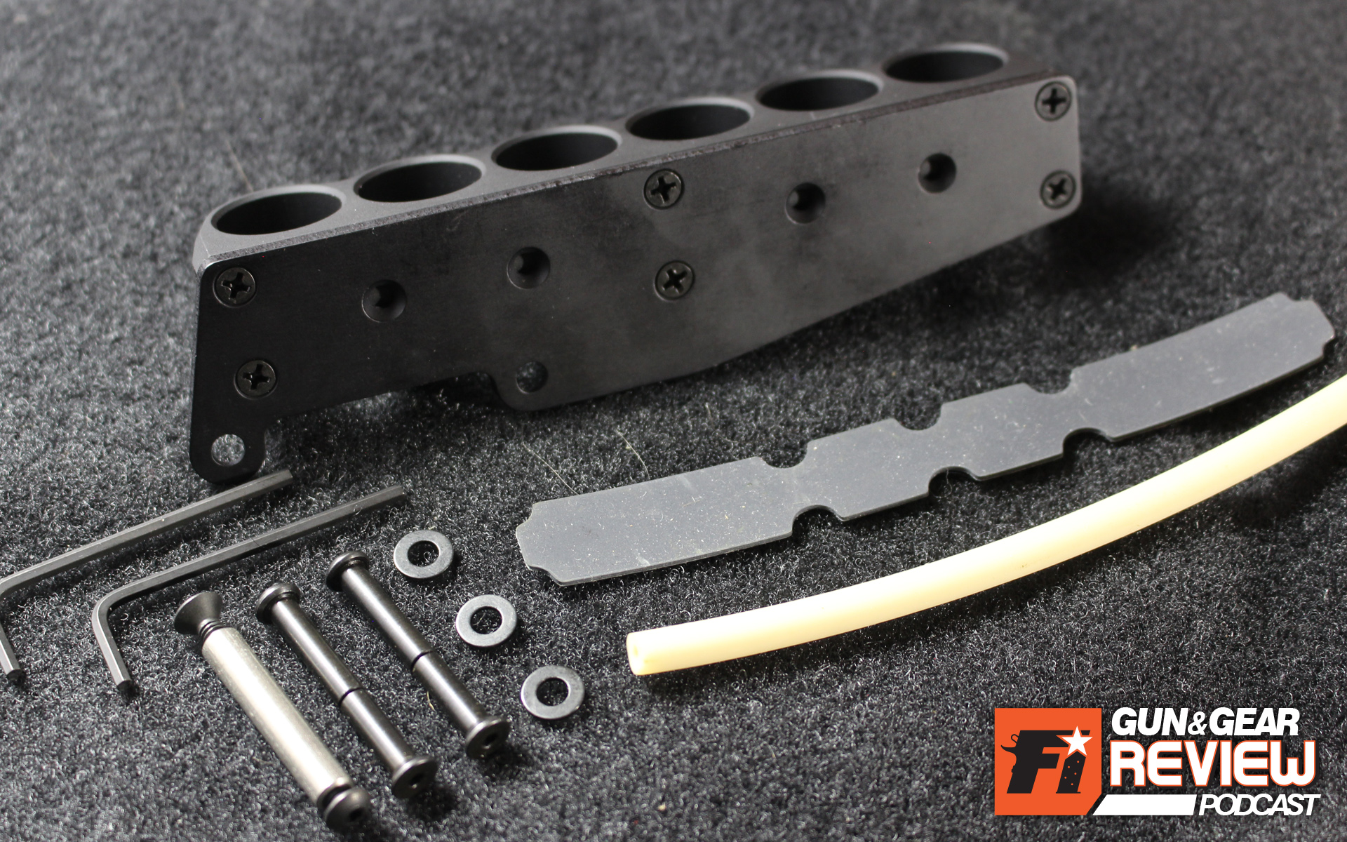 The SureShell uses a Chicago screw and a standoff pin. Comes with an extra Chicago pin set and washer in case custom filing of the female screw is needed, and you need two tries.