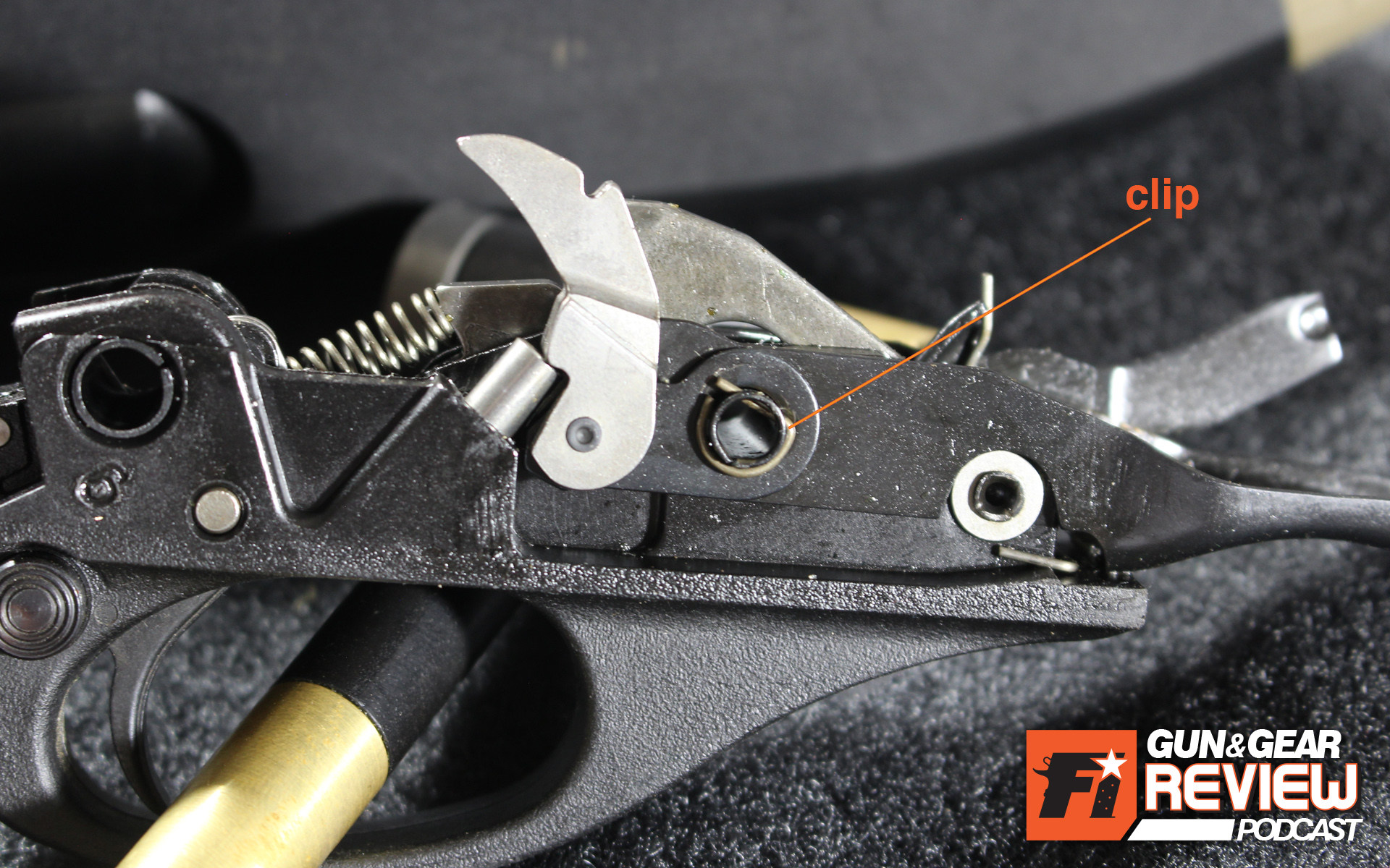 For 870 owners, its very, very important you remember to remove this clip that engages the trigger pin. If you don't, you'll be pounding away at the Chicago screw all day and possibly damage your internals.