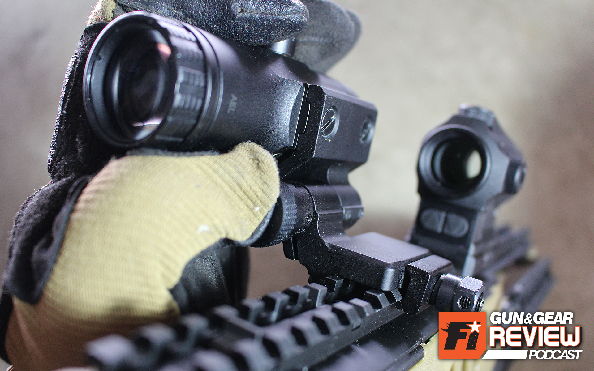 The button release on the VMX-3T is easy to actuate even with gloved hands. Just grab the scope, press the button in with your thumb and pivot to the side.