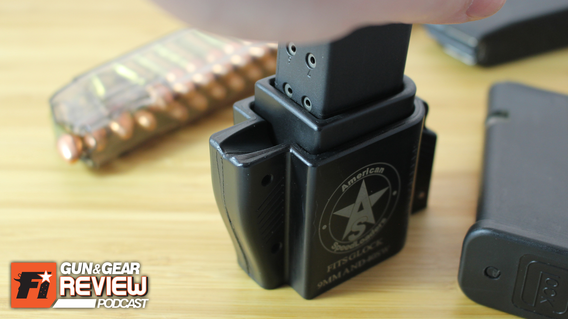 Pushing down picks up the round in the magazine. It doesn't require much force, even with the compressed spring of high capacity mags.