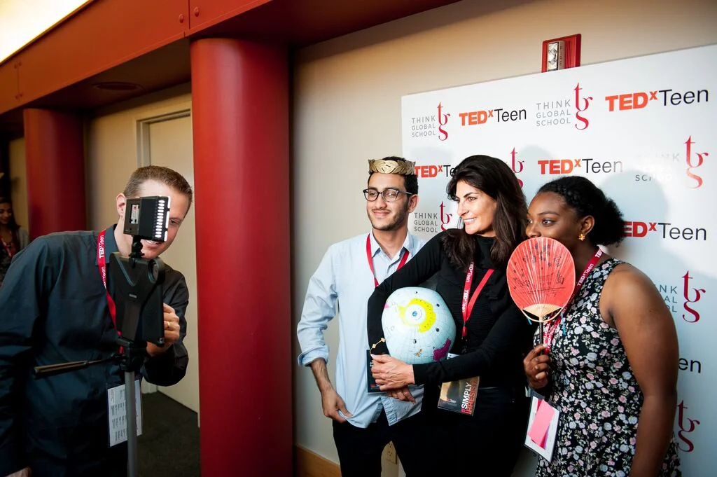 We created a Photo Booth where attendees could use our travel themed props in their photos to share on social media.