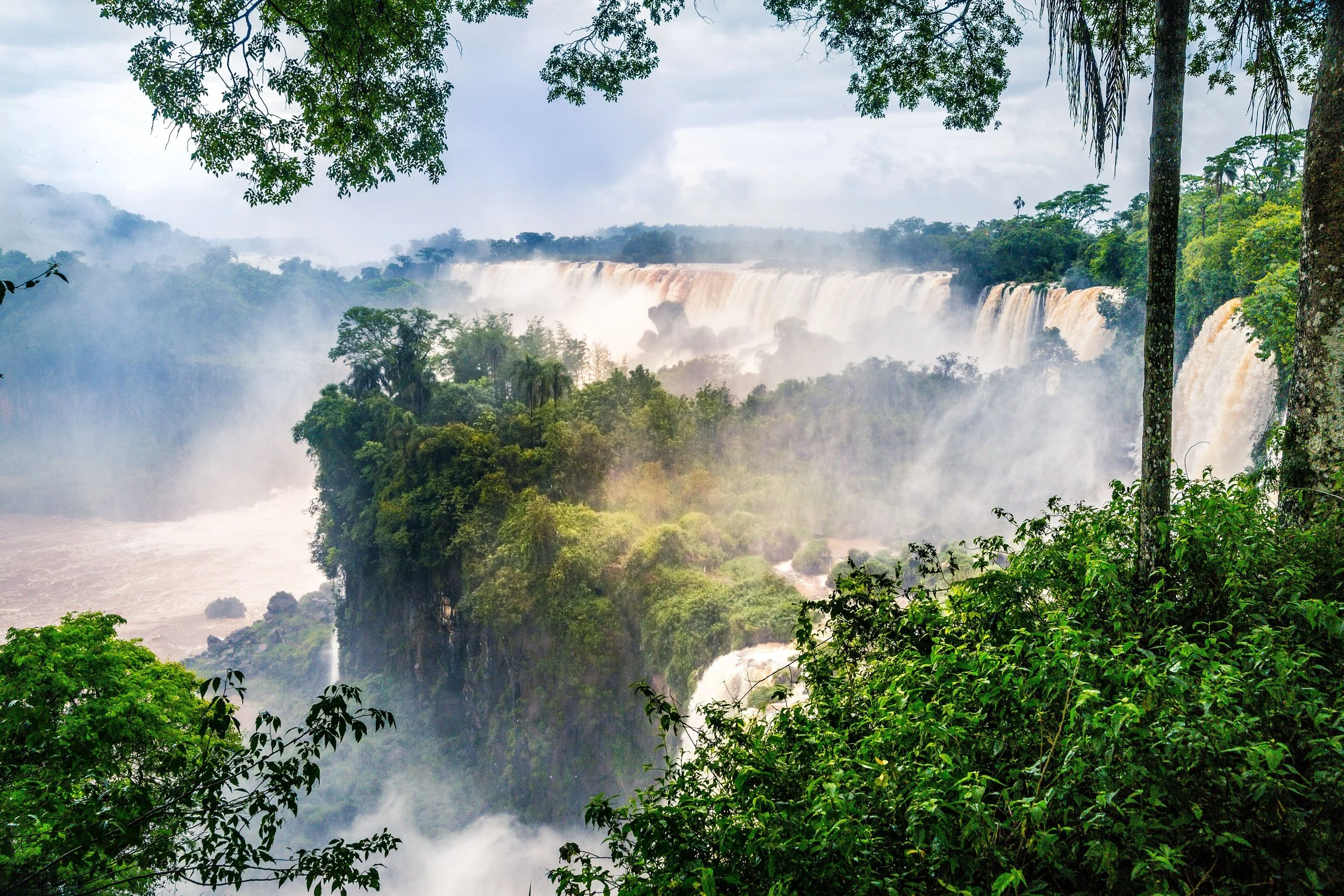 waterfall-iguazu-national-park-surrounded-by-forests-covered-fog-cloudy-sky copy-min.jpg