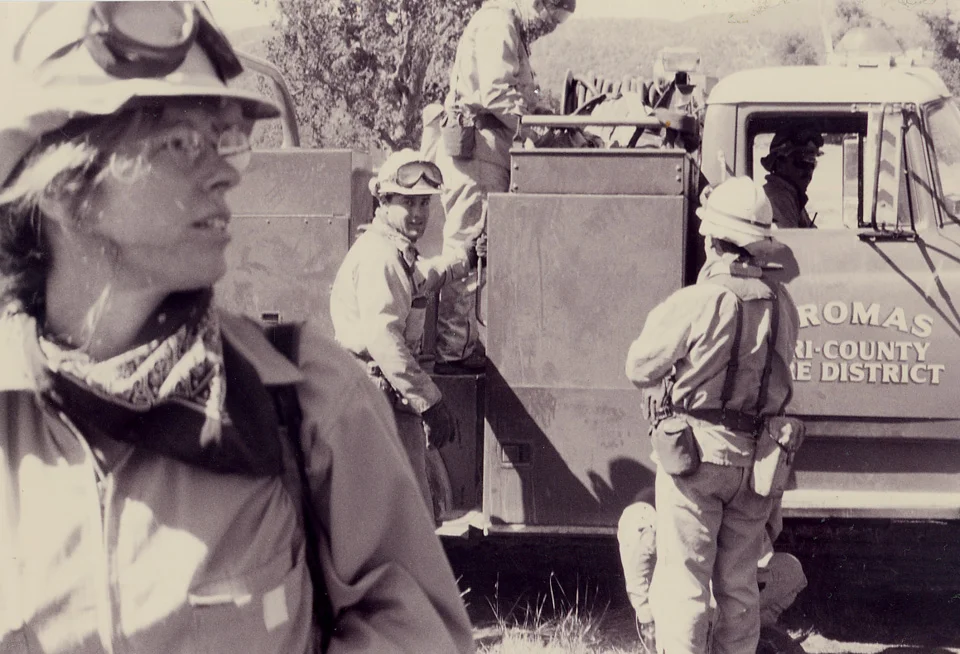 Photojournalist Maggie Hallahan, in 2000, working on telling the story of California RapiDES including the perspective of California Female Firefighters.