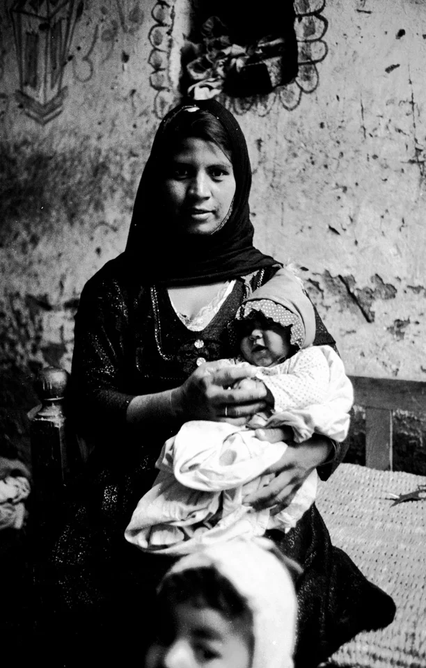 This image was photographed in1983, by Maggie Hallahan, in Luxor, Egypt for UNFPA for a project about female genital mutilation (UNFPA abbreviation is FGM) . A 2016 survey by the U.N. Children’s Fund showed that 87 percent of women and girls aged 15-49 in Egypt have undergone the procedure. According to the World Health Organization, more than 200 million girls and women have been cut in 30 countries in Africa, the Middle East and Asia. The intergenerational struggle is the economic, social and educational.