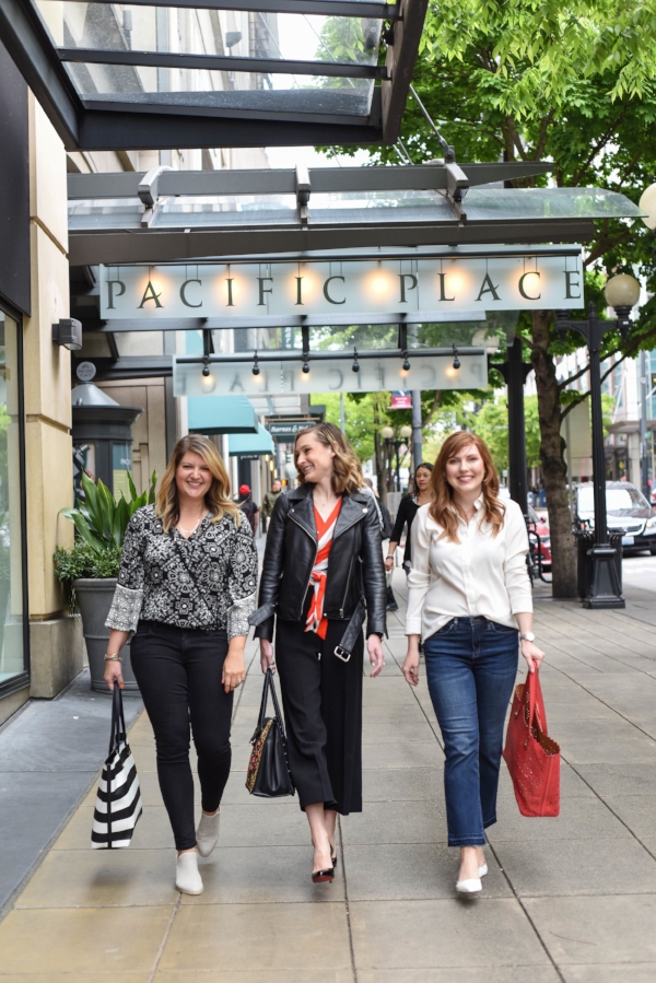 Stylists Darcy and Olga pictured outside our Downtown Seattle Pacific Place Suite