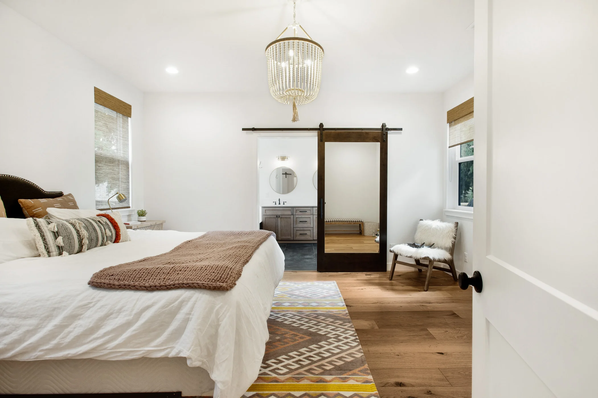 Master bedroom - still so much decorating to do in this room! My favorite part is the chandelier.