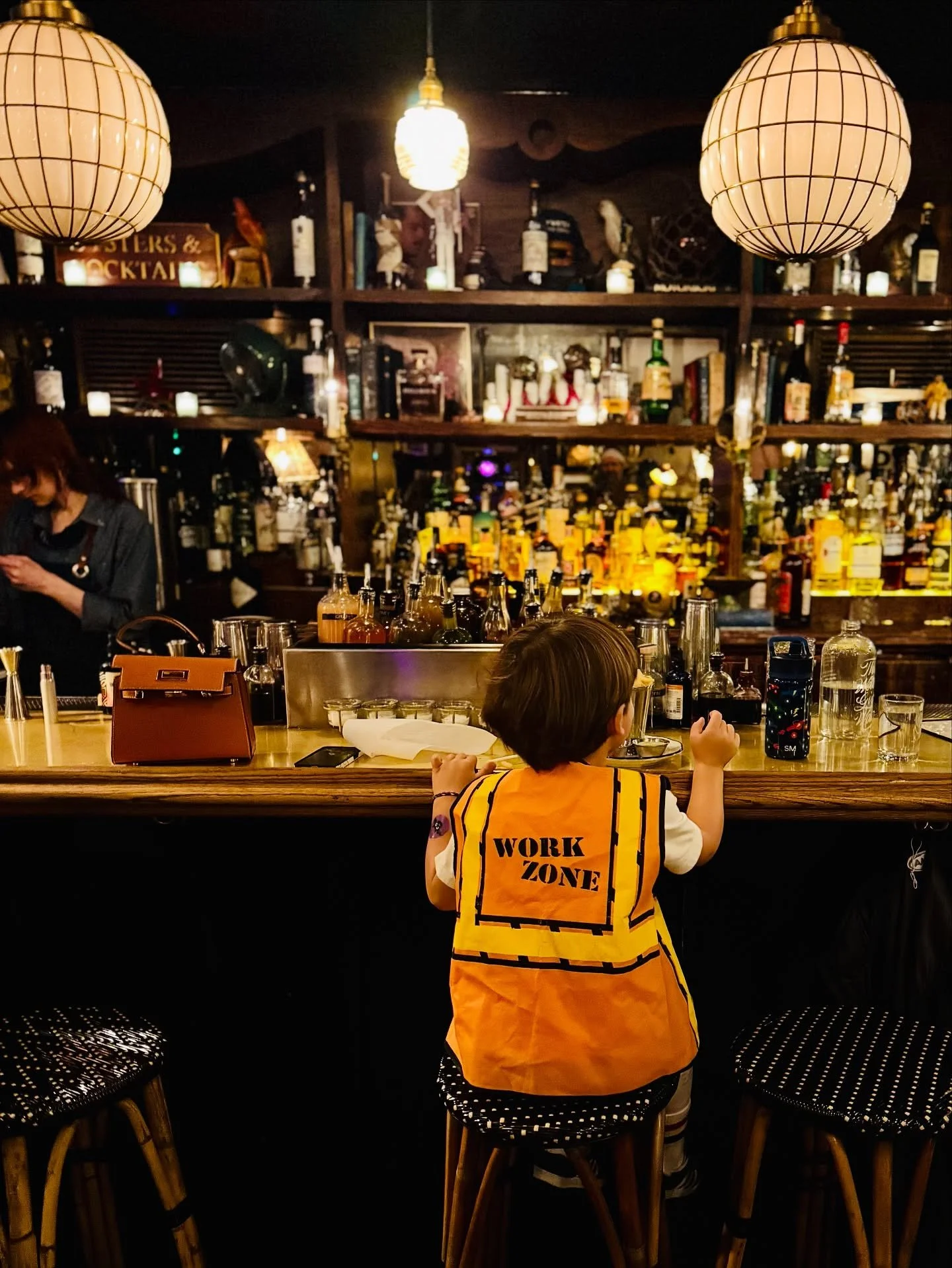 After a long day on the job, a stiff drink and some fries at the bar takes the edge off