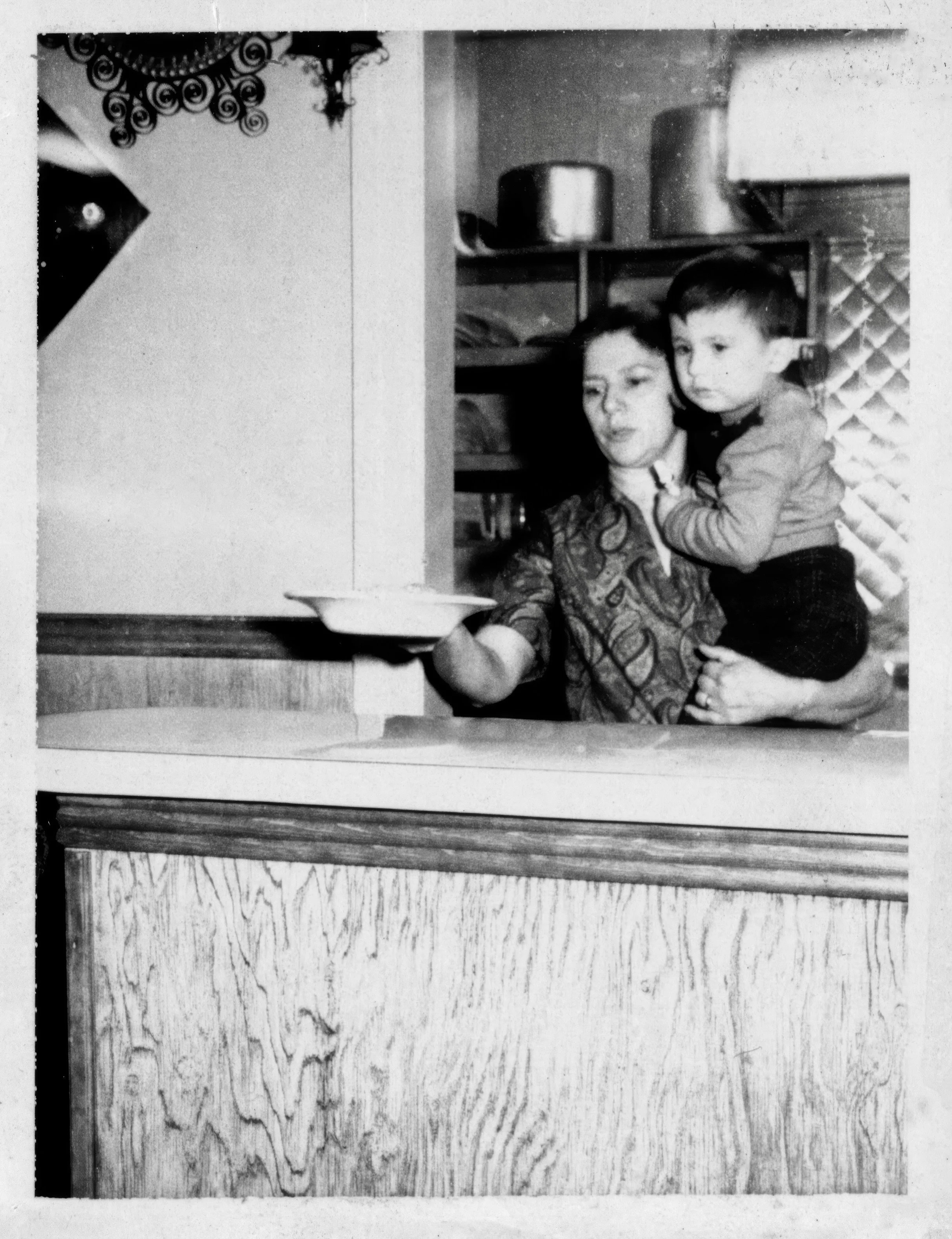 Happy Mother&rsquo;s Day! This is Pilar Montero, founder and Matriarch of @montero.nyc serving lunch with her son Frank in her arms (Pepe&rsquo;s younger brother).

Just found this photo in a drawer in the basement.