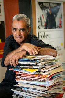 Professor Gary Foley with just some of the contents of The Aboriginal History Archive. Picture courtesy of Victoria University