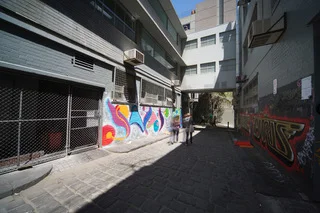Revoicing the Striated Soundscape . Four speakers installed inside readymade air-conditioners, play reprocessed air-conditioning and other site-specific sounds, recorded previously in the same location. Image © Carla Gottgens.